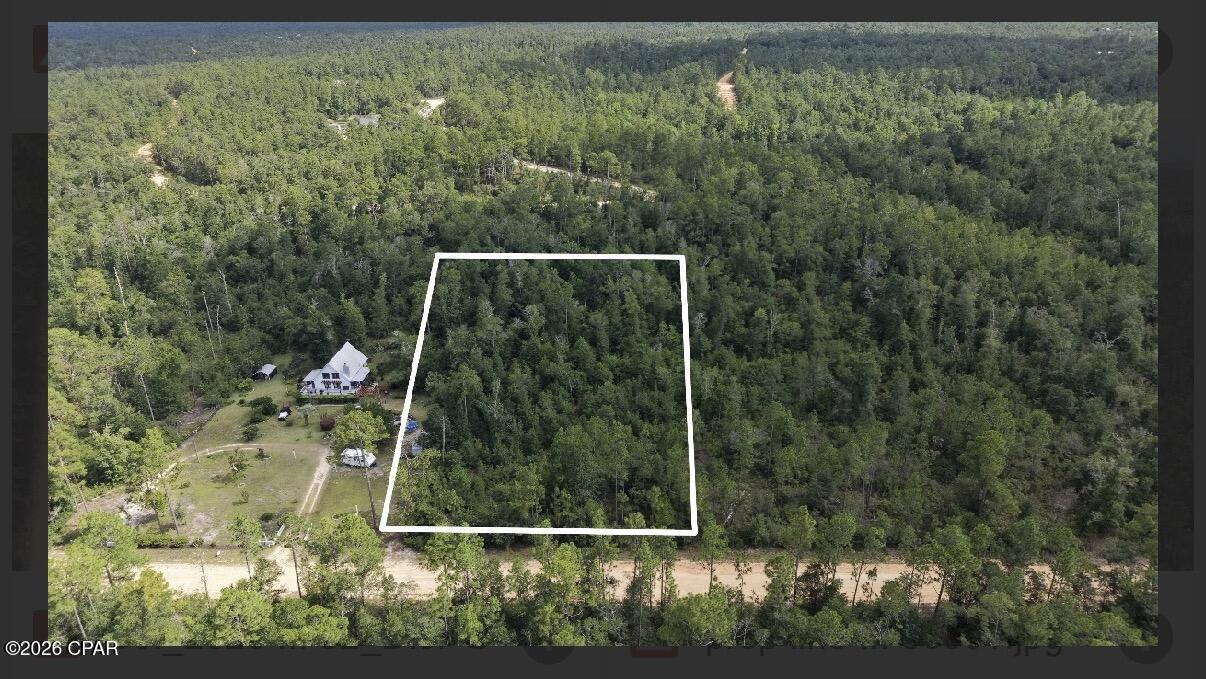 SELLER FINANCING AVAILABLE!! Beautiful lot in Compass Lake in the Hills! Close to electricity for easy connection -- add septic and well for your own private oasis! Come make this vacant lot your own.