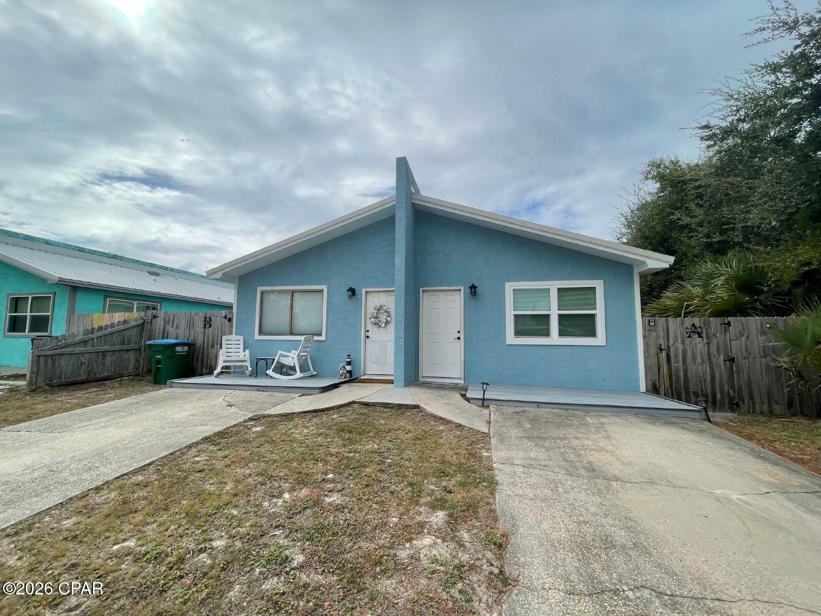 Just a Walk to the BEACH in this well maintained 1 bedroom rental just off of the Thomas Drive corridor. Unit is tiled throughout kitchen has stainless steel appliances. Covered patio in the back yard. For pets the owner will allow one small pet that is under 10lbs. Pest control every quarter and HVAC services 2 times a year. If you would like to see this property, just text a copy of your driver's license to the property management office phone number listed in this advertisement and we will get a showing lined up for you within 1 business day!