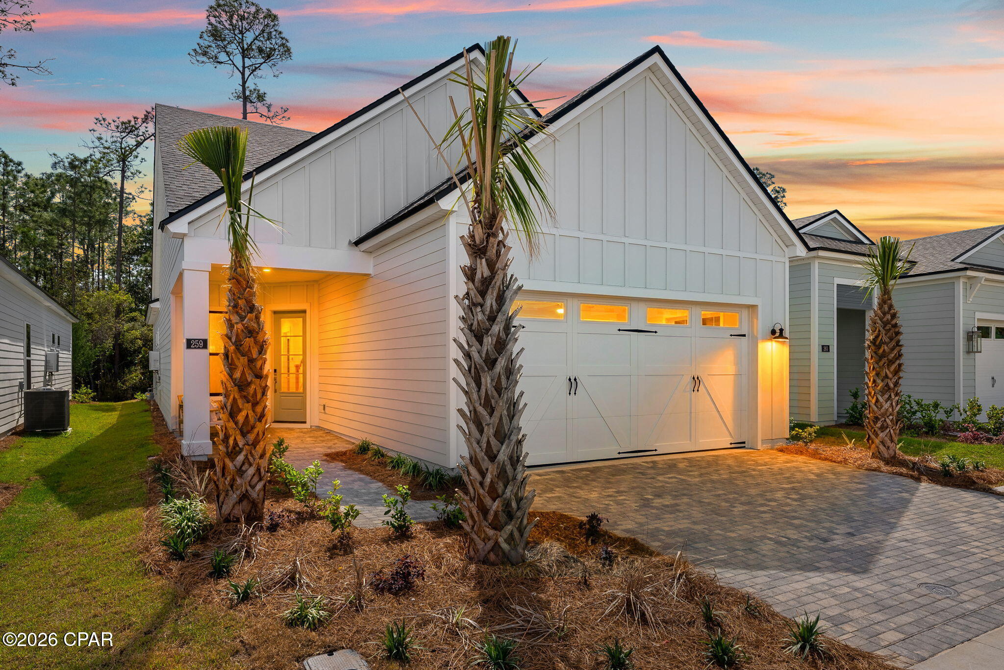 Your Toll Brothers home awaits! Construction complete available for quick move-in. This gorgeous 2-bedroom, 2-bath, 2 car garage home with an office room offers 1665 sq. ft. of elegance and comfort. From the moment you step onto the paver driveway, you'll be captivated by the blend of modern design and natural beauty. The glass-paneled office provides a tranquil space to work or relax, with an abundance of light flowing through the space.
As you enter, you'll immediately notice the soaring 10-foot ceilings throughout, complemented by tray ceilings in the spacious great room and luxurious primary bedroom. The open-concept design invites effortless living, with a beautifully upgraded kitchen featuring a large island perfect for entertaining. Whether you're preparing a casual meal or hosting friends, this kitchen makes every moment feel special.
Unwind in your primary suite, a true sanctuary with a spa-like bath featuring a walk-in tile shower, a large soaking tub, dual vanity and spacious walk-in closet. 
Step outside onto your private covered lanai, where you can enjoy morning coffee or evening sunsets in complete privacy, thanks to the surrounding privacy wall and the tranquil beauty of the woods beyond. This outdoor space feels like an extension of your living area, with the added luxury of paver details that tie everything together. This gated community is filled with resort style amenities, including pool, clubhouse, fitness center, pickleball courts, tennis court, playground, and a multi-purpose field. Short drive to public beach access, Pier Park shopping, dining and fun entertainment, airport, future FSU/TMH medical campus, future West Bay Center with Publix and recreation outdoor activities at Frank Brown Park.
Don't miss out on the opportunity to live in a place that combines luxury, serenity, and convenience all in one. Call today to schedule your private tour.