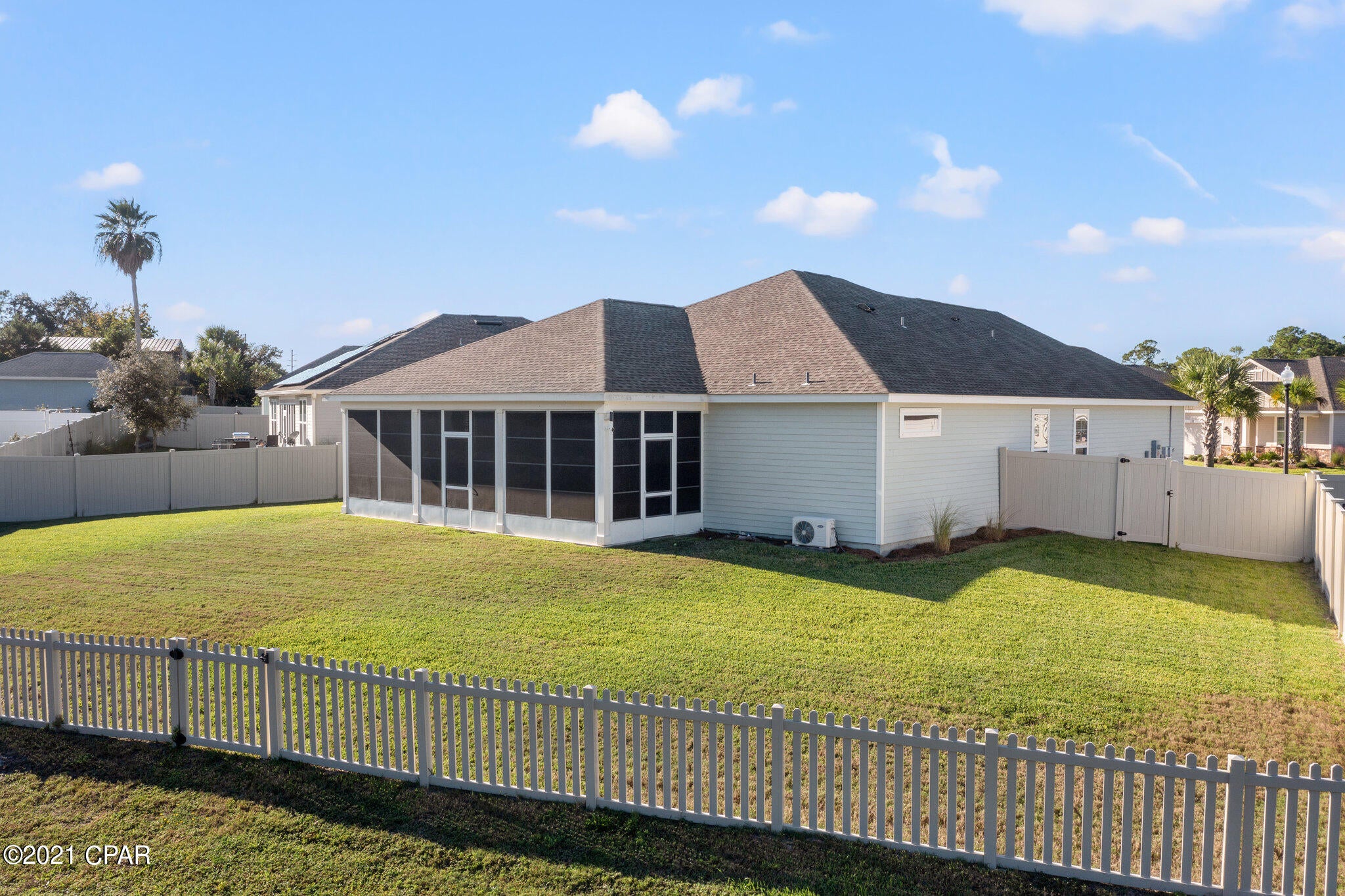 4 minute golf cart ride to the beach & 10 minutes to 30A. Welcome home to the west end community of Whisper Dunes!  A premier Samuel Taylor Homes development on the quiet side of PCB. This 2017 built home offers one of the least expensive, low maintenance opportunities to own in Panama City Beach.  Perfectly positioned on an oversize premium lot with pond views to look at in the Air Conditioned rear patio.  Whole Home Solar panel gives peace of mind for fixed costs and electrical outages from weather.   Guardian Air Filtration system keeps the air quality high 24/7.  Lawn care, & community pool included in your quarterly dues!