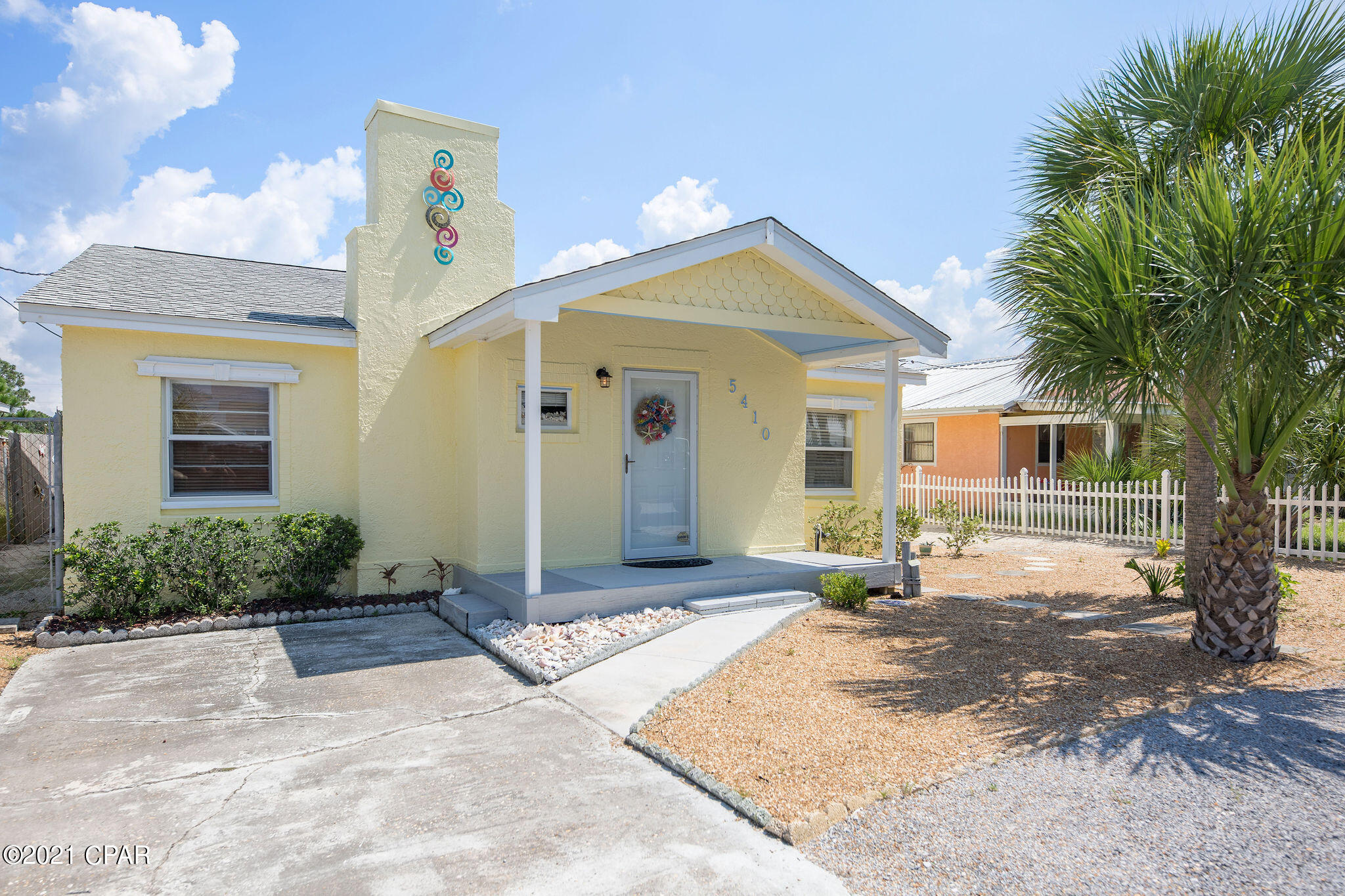 'CURRENTLY UNDER CONTRACT, SELLER ACCEPTING BACKUP OFFERS' If you are looking for an Old Florida style furnished bungalow that's built like a tank and within a 5 minute walk to the beach... you have found it!! Beautiful original heart pine ceilings throughout, new stainless steel appliances, large fenced backyard with storage building, low-maintenance landscaping, newly painted exterior, and in a golf cart friendly community. There is no HOA on this part of the beach and though the owners never used this as a rental property, the rental potential here is fantastic! Just 2 blocks off Thomas Dr and 3 blocks from the white sands of PCB, you will be close to many attractions such as Schooners, Newby's, Patches Pub, local shops, and St.Andrews State Park. Make your appointment to see this one!