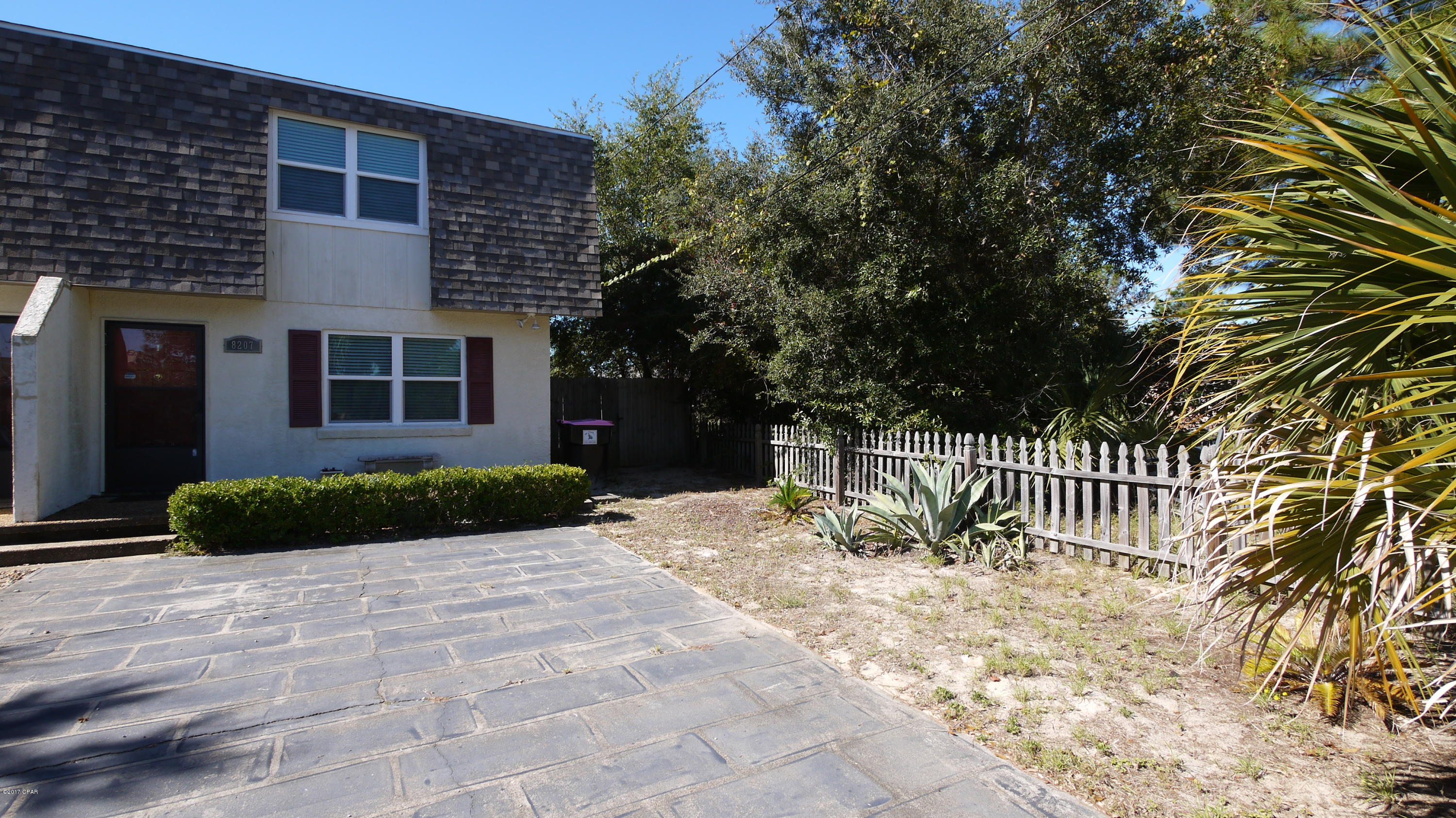 2 bedroom 1.5 bath townhouse. Just a few blocks from beach access. Updated kitchen, washer & Dryer and water included. Privacy fence, back patio and extra storage.