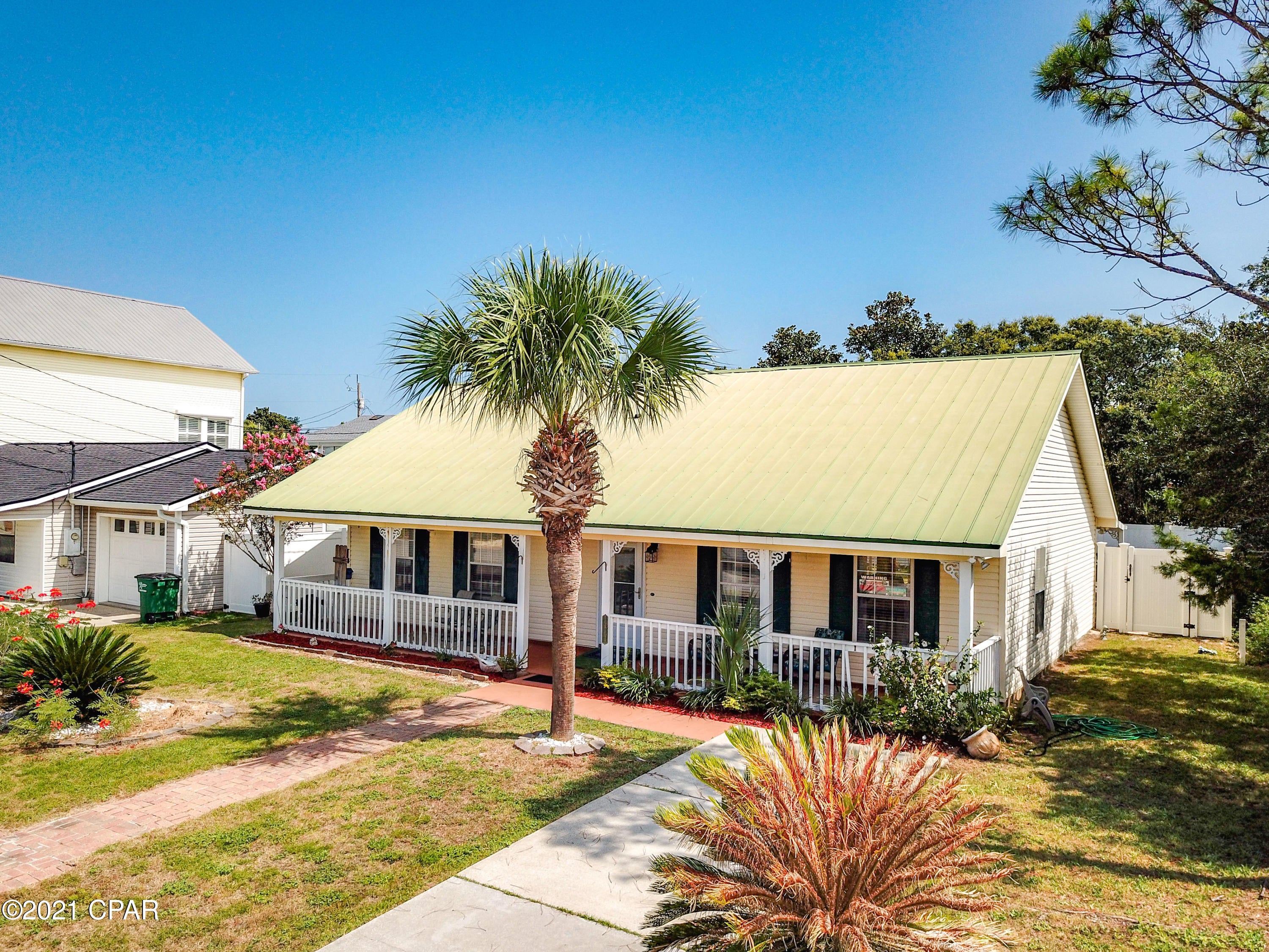 Currently under contract Seller accepting back-up offers.   This wonderful cottage is located only 2 blocks to dedicated Bid-A-Wee beach. Here you will find a spacious open floor plan with the living, dining and kitchen combined.The kitchen has granite counters and a free standing island.   The main bedroom is large with an en suite bath and a walk-in closet. 

The back yard is surrounded by a tall privacy fence and there is small covered patio for your morning coffee. A large additional deck has a gas fire pit for cool evenings at the beach.  There is a covered front porch across the entire front of the home where you can relax in the evening and enjoy the ocean breezes. Don't miss this opportunity to have your own beach home. All measures are approx. Buyer to verify if important.