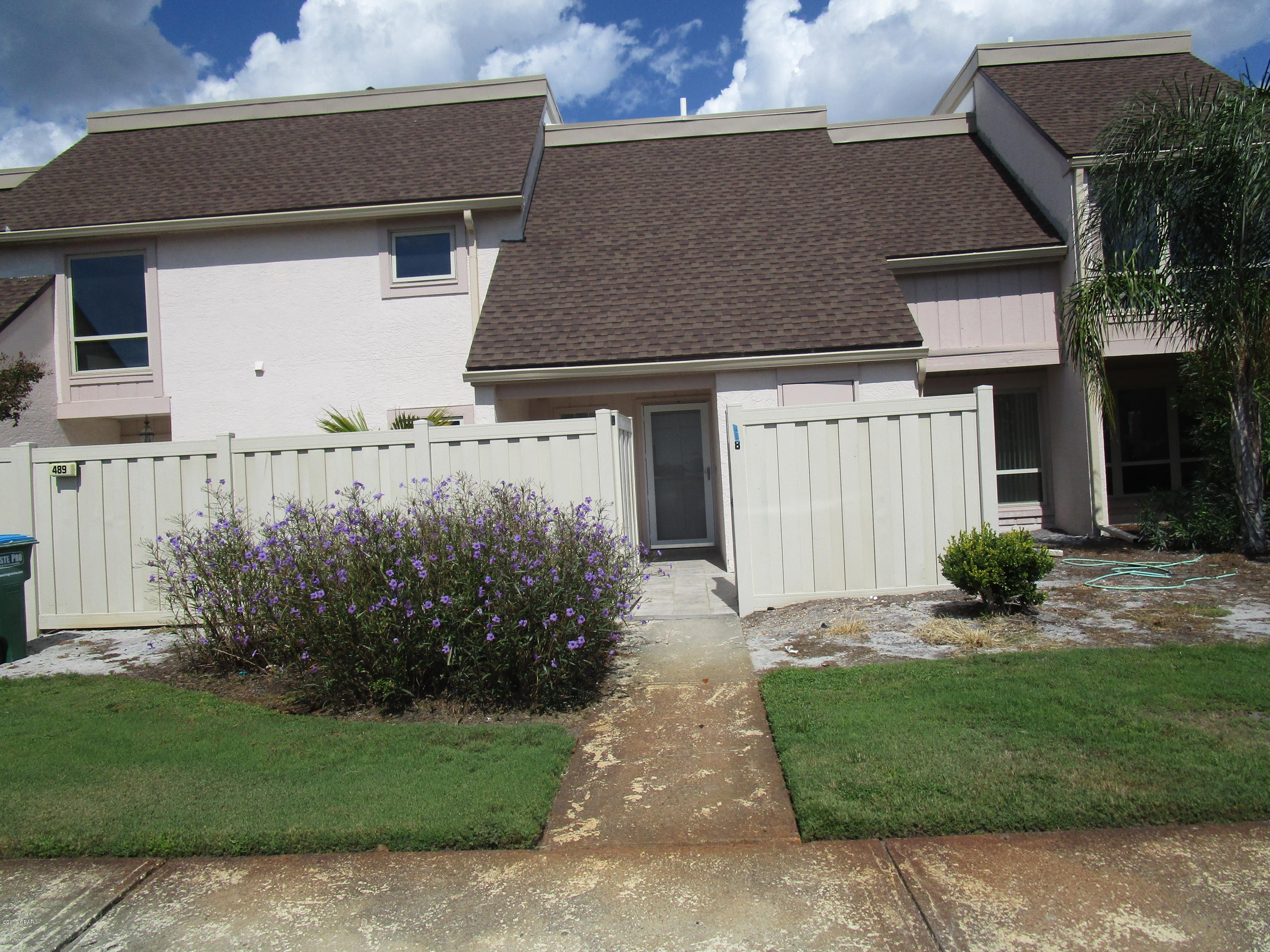 This townhouse style condo has been totally remodeled since the hurricane. The ground floor has a living room, kitchen, laundry room and powder room. Upstairs has 2 bedrooms and 2 full baths. Bay Point is a gated community with a championship golf course, restaurants, clay tennis courts, 24 hour security, and an on site Sheraton Resort Hotel. It has a new deck overlooking a scenic golf course pond.