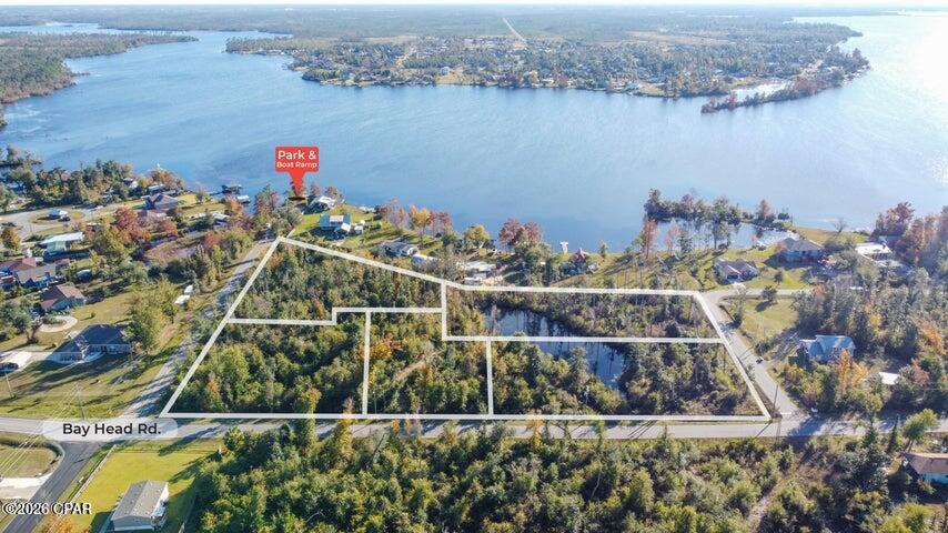 4.72 acres located in Youngstown, consisting of five parcels. Property is great for your dream home with Lake views and pond on property.


The property is located in a low-density, rural area with limited surrounding development and minimal traffic. Deer Point Lake views are present, and the property is near a public boat ramp, providing access to freshwater recreation.


Property Details:

Total acreage: 4.72 acres

Zoning: R-1 Single Family Residential

Suitable for development or single homesite

Deer Point Lake views

Paved road frontage on Bay Head Road

Nearby lake access and boat ramp

Location & Distance Information:

18 miles to Downtown Panama City

24 miles to Tyndall Air Force Base

23 miles to Panama City Beach

30 miles to Northwest Florida Beaches International Airport (ECP)

43 miles to I-10

This property offers acreage, lake-area proximity, and a quiet setting while remaining within driving distance of major employment centers, beaches, and transportation corridors. Ideal for buyers searching for land for sale in Youngstown FL, acreage near Panama City, R-1 zoned property, or property near Deer Point Lake.

Buyer to verify all measurements, zoning, and development potential.