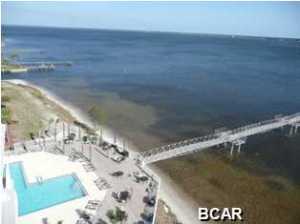 This Beautifully Decorated Fully Furnished Unit has Outstanding Views and Amenities, POOL & Hot Tub, Gym and Community Room overlooking the Bay as well as your Great Room, Master Suite and Balcony... large master suite with KING sized bedroom furniture, Glamour Bath with Large Walk In Closet, Jacuzzi Tub and Separate Shower, Plus HIS/HERS Sink.. Plus NICE 2nd Bedroom and Bath with Shower. Bridgewater has Tennis Courts, Biking, Walking, and is a Gated Community - Nice Neighbors too and close to the BEACH, Navy Base, Coast Guard Station and Attractions! Can not beat $1,400 month with Shared Garage! All utilities included except Power/Internet.... The Basic Cable TV, water, Sewer, garbage IS included. Sorry, No Pets. First/Last/$700 Security Damage deposit