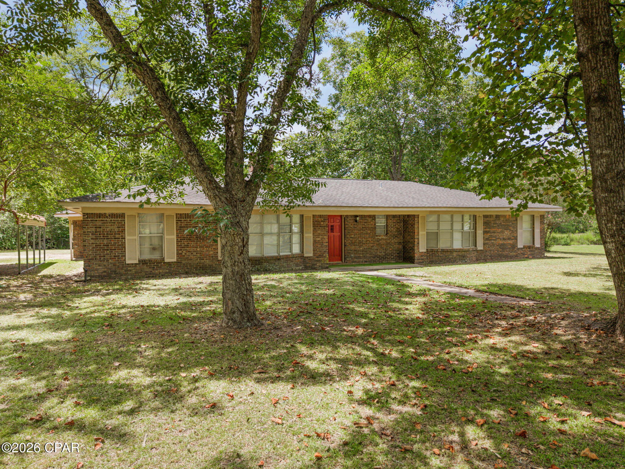 If you've been searching for a property that offers more than just a home, this one deserves your attention! Situated on approximately 17+/- acres, this 4-bedroom, 2-bath brick home combines comfortable country living with an impressive amount of usable land and agricultural infrastructure. Inside, you'll find a versatile floor plan with multiple living areas, generously sized bedrooms, dedicated dining space, and a large brick fireplace that adds character to the main living area. The kitchen offers plenty of cabinetry and workspace, while the home provides a great foundation for updates and personal touches. Step outside and the property really begins to set itself apart. Open acreage provides room for animals, farming, recreation, or simply enjoying the freedom that comes with having land, while mature trees and a pond add to the peaceful rural setting. Three former poultry houses offer a tremendous amount of existing agricultural space and the opportunity to repurpose them for equipment, hay, livestock, or other agricultural needs. Located just off Highway 2, this property is an exciting opportunity for anyone looking to create a homestead, establish or expand a farming operation, keep livestock, or simply own a sizable piece of the countryside.