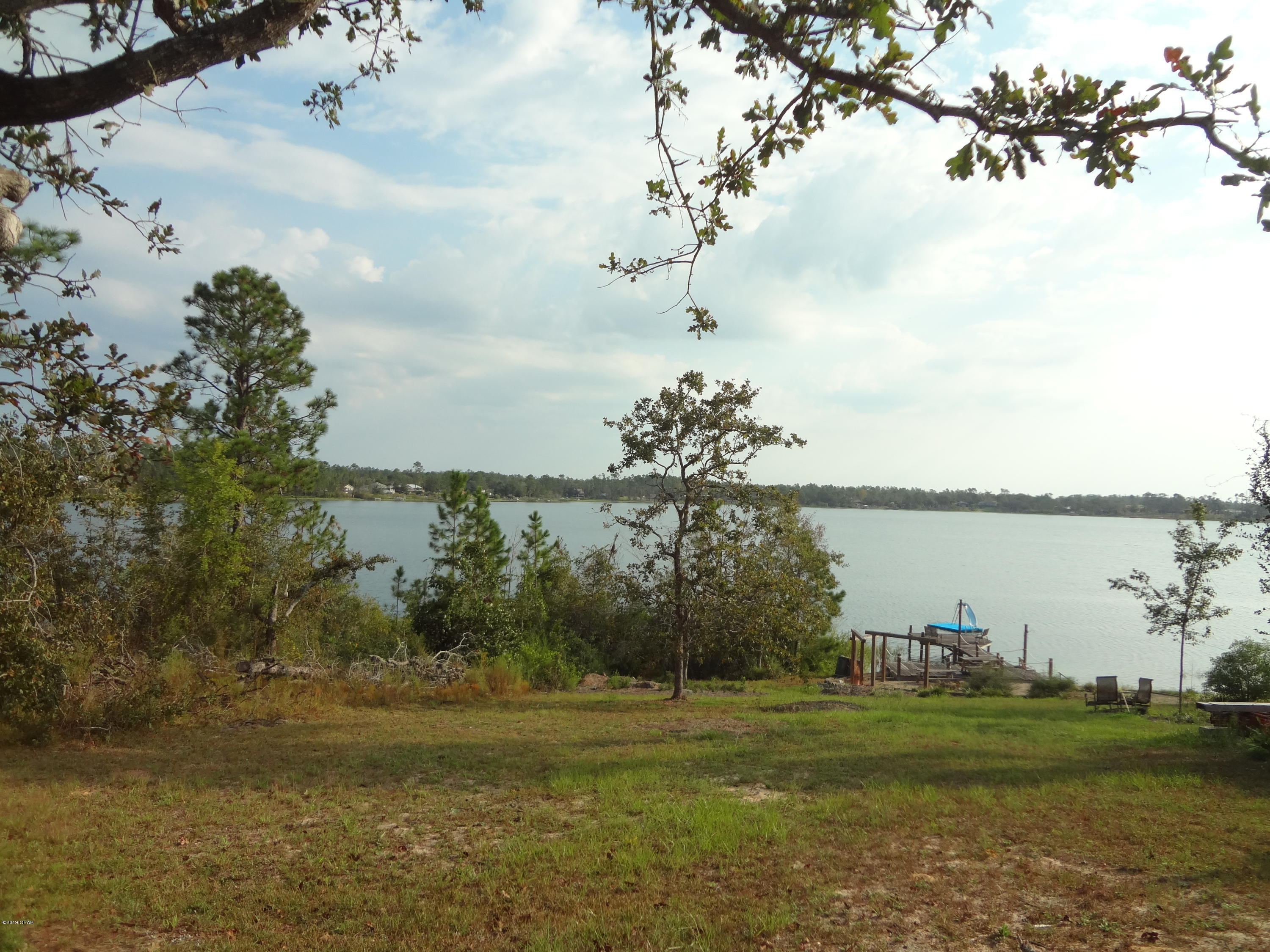 Great get-away location, (.94 acre) on beautiful spring fed Silver Lake, build your dream home or bring your RV to relax and enjoy one of Florida's most pristine lakes.

Power pole in place and well, owner has not used in awhile and has not verified working condition. Survey available.