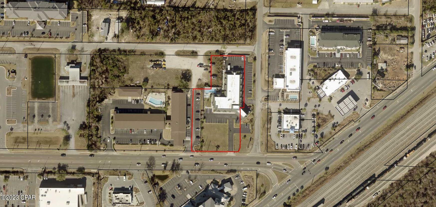 PERFECT LOCATION FOR A DRIVE THROUGH COFFEE SHOP.  Superb location on 23rd street with high traffic count and visibility.  Property is located right before I Hopp on the left and corner of Mercedes Street, and in front of 'Days Inn Suites'.   Seller is interested in splitting/dividing this parcel in front of the Hotel as he has no need for it. There is allready a paved road to access the parcel.   Land is high and dry and ready to build for office building, oil change  and numerous other possibilities. Lots and commercial land are  scarce on 23rd Street.  This section is waiting for you to build out.  Land section measurements are approximately and should be verified by Buyer or Agent. Approx land measurement is around 150 x 113.