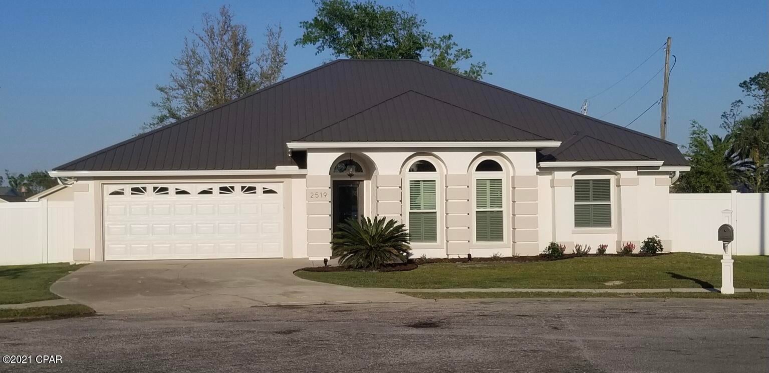 CURRENTLY UNDER CONTRACT, SELLER ACCEPTING BACKUP OFFERS Located on a quiet cul de sac, yet convenient to everything, this home is in the perfect spot. It boasts a new attractive metal roof, brand new double hung (open from top or bottom) hurricane rated windows accented with interior vinyl shutters. Entry door frames were replaced with maintenance free vinyl and all new composite doors. A/C is new. Floors just installed were done in luxury vinyl plank in the living area and carpet in bedrooms. Ceilings are 10 foot and there are new LED lights installed throughout the home. In the master bath you will find a new jetted soaking tub, double sinks, and new bronze fixtures along with large walk-in his and hers closets. The main bath has a tub/shower combo with new bronze fixtures. Access the extra spacious backyard from the living for entertaining or hanging out on the patio. This backyard has enough space for a pool AND a workshop and is fenced with a new beautiful white vinyl fence. Extra care was taken when restoring this home to make sure everything was done right with high quality fixtures and materials. Drive your golf cart to Publix or out to eat in various choices not far away. If you don't own a golf cart, take a walk, it's that close. Come see this home in this highly desirable location.