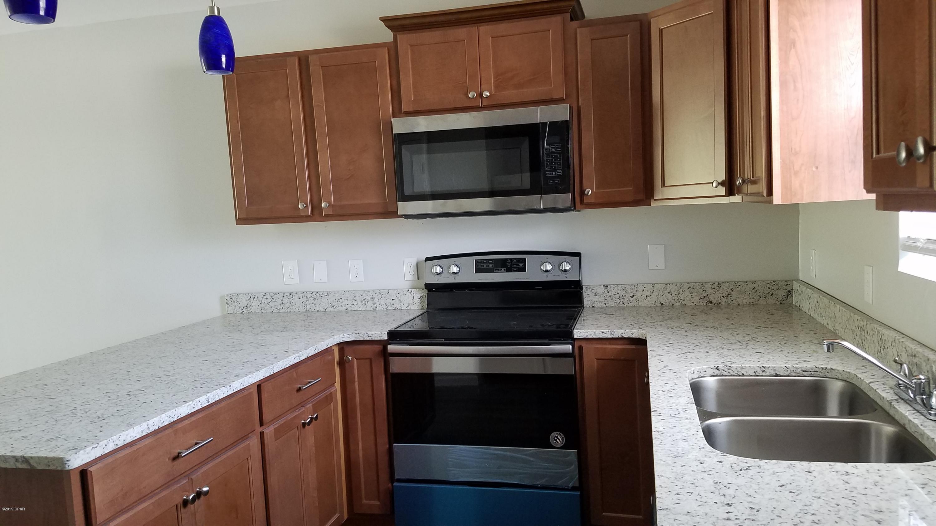 For Rent! 2BR/1.5BA townhome centrally located near Tyndall Air Force Base. Unit has been completely renovated including vinyl plank flooring throughout, granite countertops, and new stainless steel appliances. Unique floorplan features 2 bedrooms and full bath downstairs, and open floor plan living room, kitchen, and half bath upstairs. Washer/dryer connections. Contact 850-233-7926 for more information today!