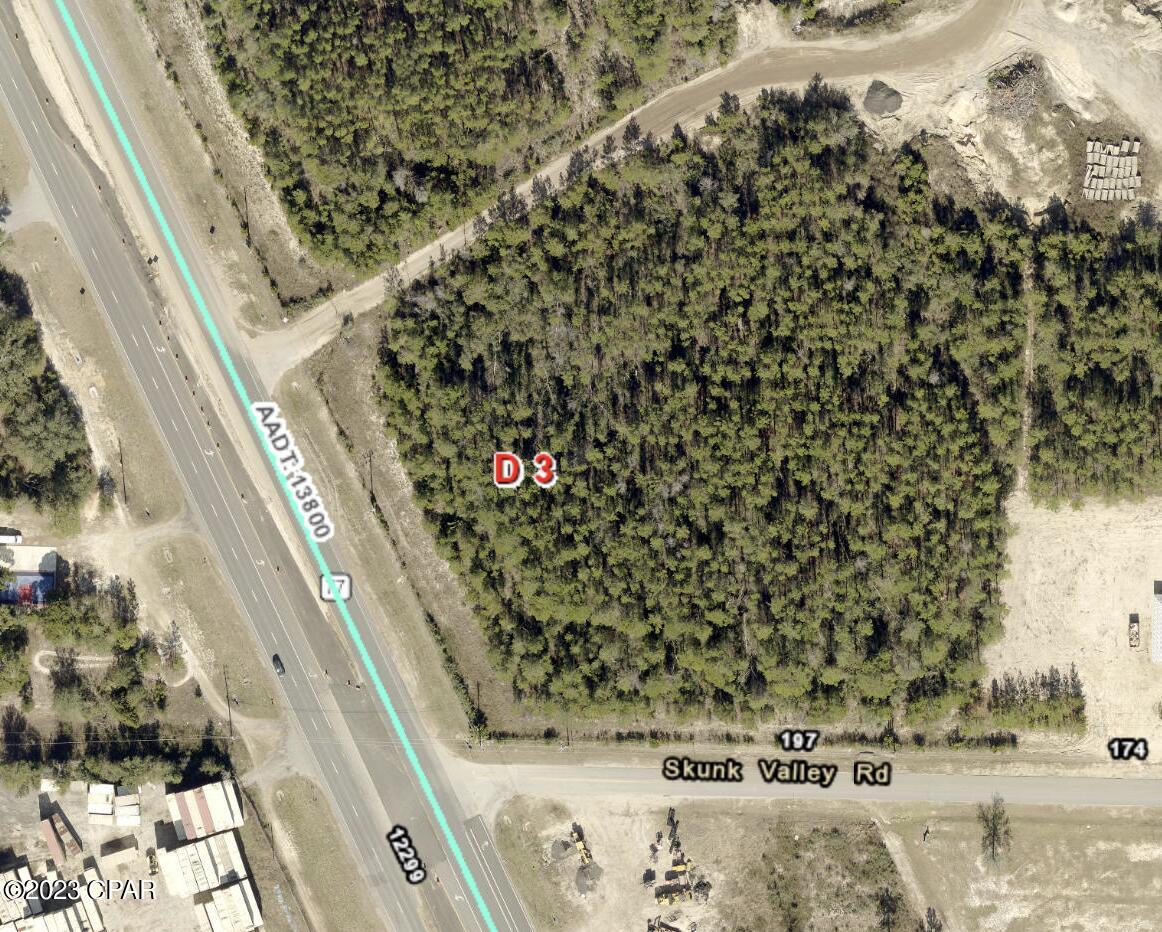 Great High and Dry Commercial corner with water and sewer.