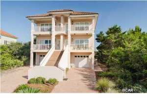 The three level attached home combines contemporary design features with a coastal influence. The house has a private driveway and attached garage with parking for three cars. High ceilings, multiple windows, and French door access to the porches enhance the feeling of spaciousness and open the house to the gorgeous views of the Gulf of Mexico and the community of La Valencia. The house has been completely refurnished featuring original art, designer lamps and some one of a kind pieces in beautiful coastal tones. The house has four bedrooms each with its own adjacent bathroom and there is an additional kitchenette and table serving the ground floor suite. All the guest bathrooms are tiled and have shower / tub combinations. The master bedroom is spacious with a seating area, king bed