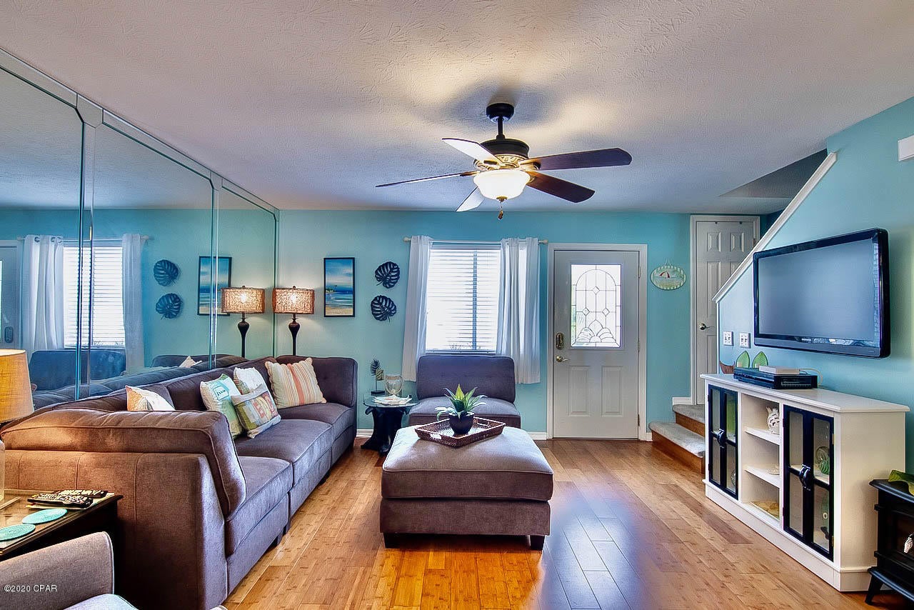 Beautiful town home on Corner lot.  Recently remodeled and updated with Bamboo Laminate flooring,  and tile floors in kitchen, dining and bathroom areas.  On demand hot water heater.  This town home is located in one of the best areas of the complex.  Just steps away from the Gate entrance on Churchwell and walking distance to Applebees restaurant across the street.  Heated pool and shuffleboard courts located in the back yard which is very private with town homes that serve as a perimeter to add privacy.  Gulf Highlands Beach Resort is a gated community with 11 swimming pools, One on the Beach side, located behind the  restaurant.  4 Tennis courts, shuffle board courts and a 2 acre miniature golf course, play ground for the kiddos.  Owner's pets allowed. This is a must see before you buy!