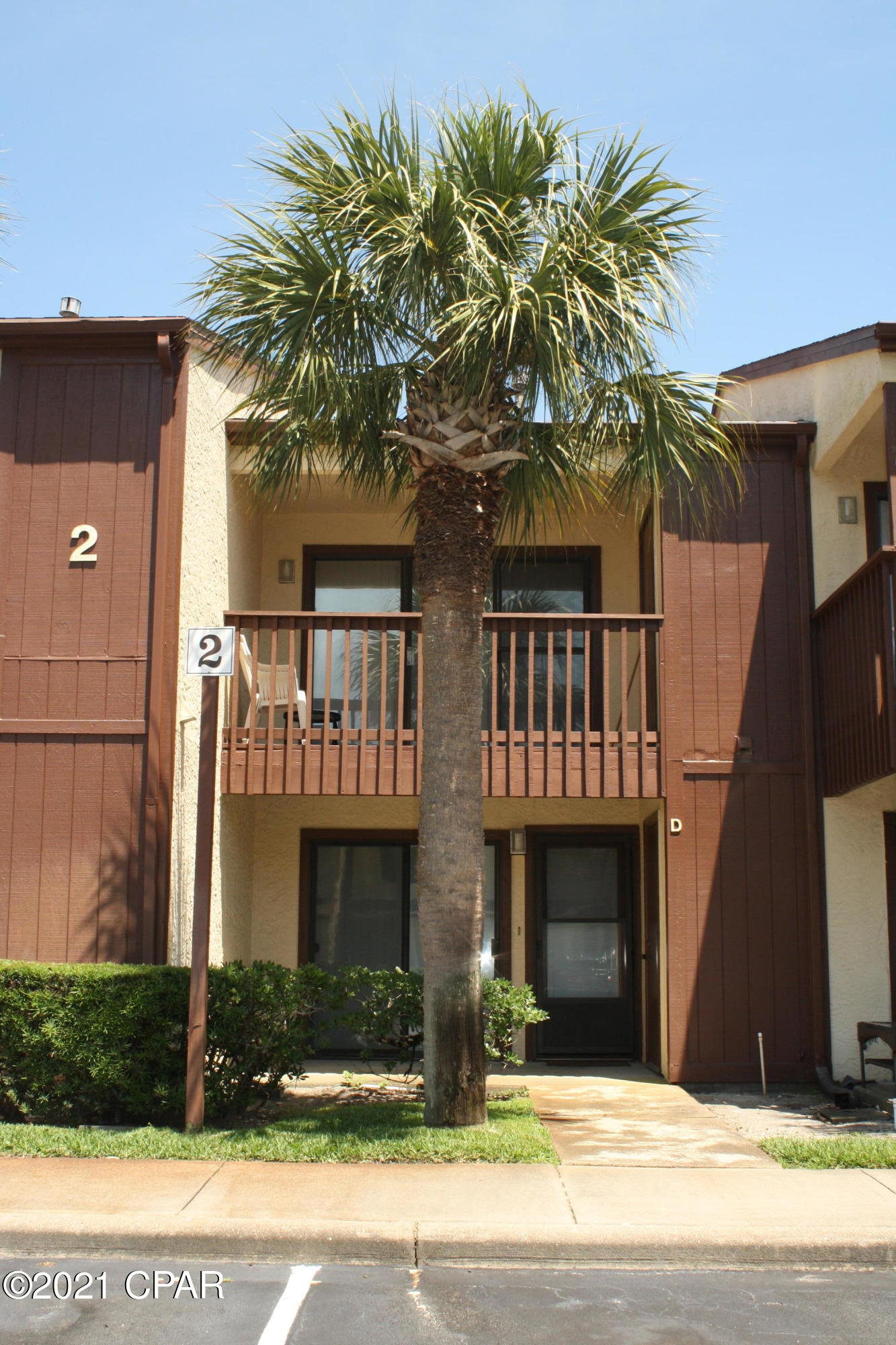 Beachwalk is a wonderful complex. It is beautiful and maintained well. There is a big in ground pool and club house. There is tennis courts and a shuffle board court. There is a walk way to the beach. Beachwalk is located a little West of Hwy 79 and is less than a mile away from Pier Park.  The unit is 2 bedroom and 2 bathroom. It has tile floors down stairs and carpeting upstairs. The living room and kitchen and one bath are down stairs and 2 bedrooms and one bath upstairs. The master bedroom has a balcony with a storage closet. There is another storage closet outside before you come in the front door. You even have a little area outback to grill or sit out.  It needs updating but is ready to move into today. This is a great location and the perfect spot to live or vacation.