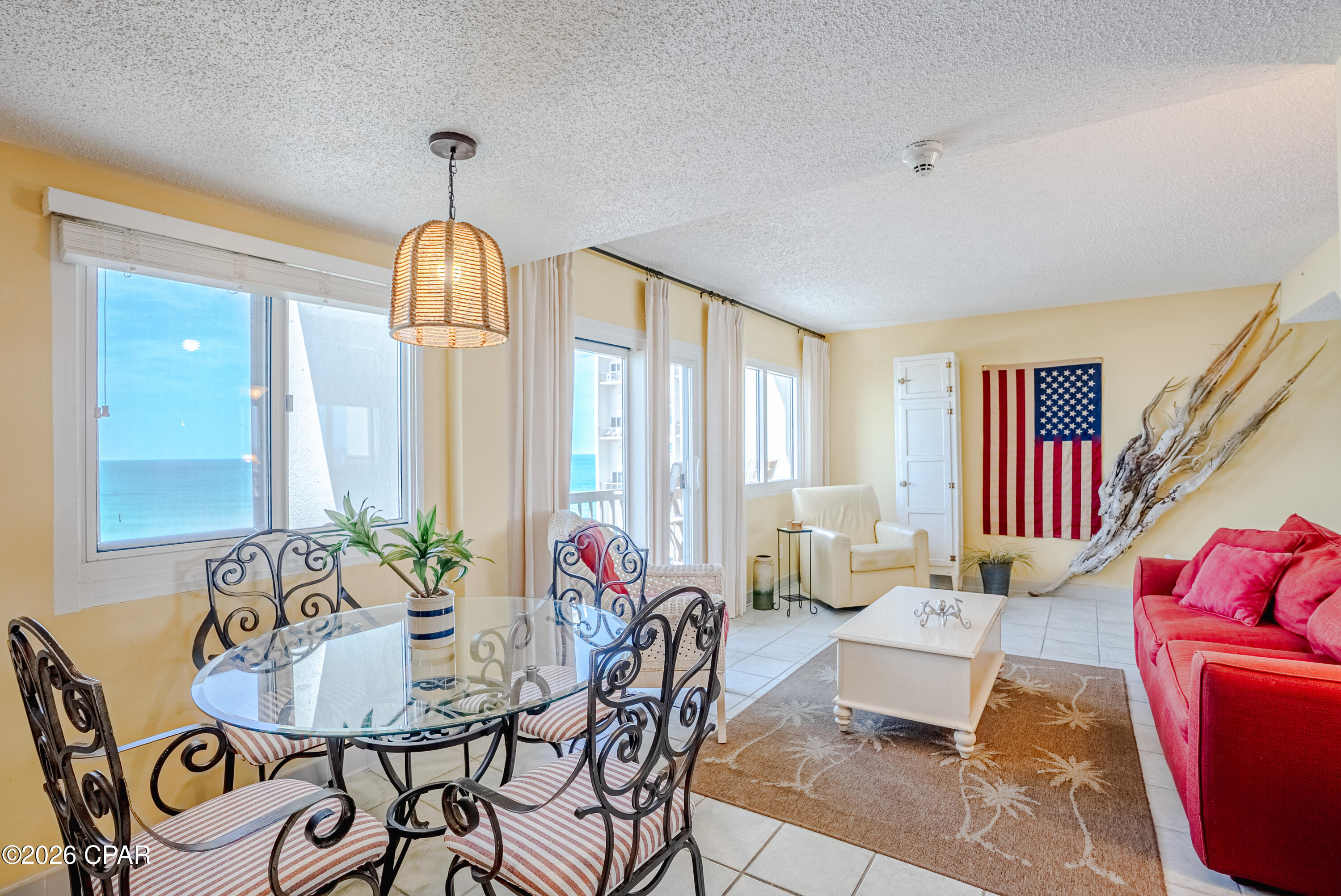 Motivated seller! bring all offers. Enjoy spectacular 9th-floor views overlooking the pristine beaches!

Experience coastal living at its finest in this beautifully positioned beachfront condo located within the highly sought-after gated community of Carillon Beach. Situated at 23223 Front Beach Rd. #907, this stunning residence offers direct beach access and breathtaking Gulf views from one of the most desirable stretches of Florida's Emerald Coast.

Nestled in the back section of the exclusive Carillon Beach community, residents enjoy a peaceful and private atmosphere while still being just minutes from the best dining, shopping, and entertainment that Panama City Beach and scenic 30A have to offer. Pinnacle Port offers resort-style amenities, including pools, tennis courts, a fitness center, boat docks on Lake Powell, and miles of pristine beach.

Ideal as a primary residence, second home, or investment property, this condo has never been a rental and has been enjoyed exclusively by the owner and their family.

The primary suite boasts direct access to a private balcony overlooking Lake Powell, perfect for enjoying your morning coffee or watching the sunset.

Come experience everything Carillon Beach has to offer.

All information available to the Seller and Listing Agent has been provided in the listing and disclosures. If information is not included, it is not available to us. Buyers and their agents are responsible for verifying all information that is important to their purchase, including but not limited to HOA rules and regulations, leasing restrictions, fees, room dimensions, square footage, lot size, taxes, and any other property details. All measurements and listing information are approximate and should be independently verified by the Buyer and Buyer's Agent.