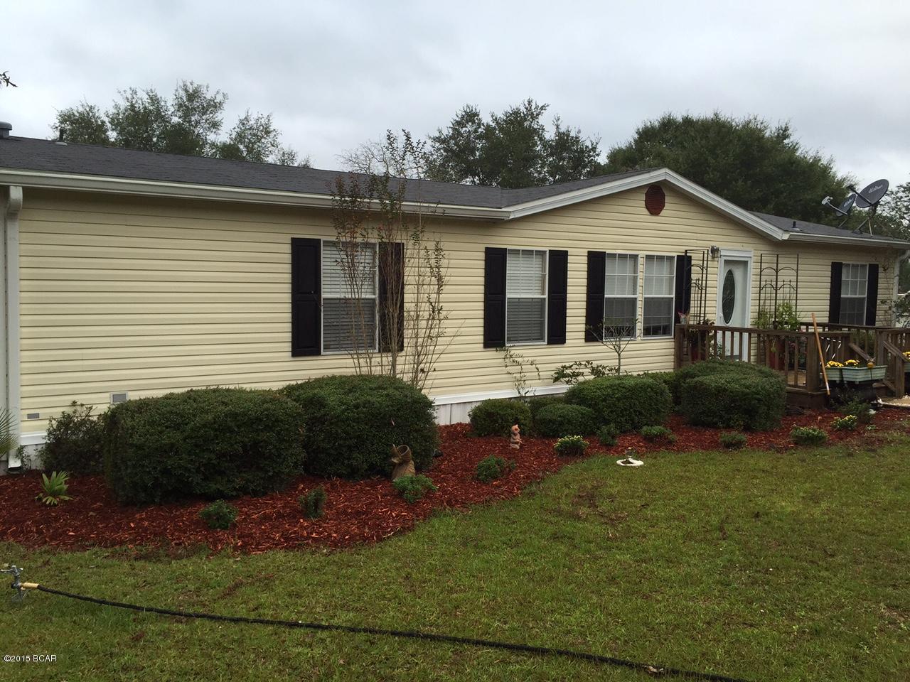 This waterfront home has been recently remodeled, upgraded and ready for a family that enjoys living on a large, gorgeous clear lake. An open floor plan, it has 3 bedrooms, 2 baths with vaulted ceilings. The master bathroom was gutted and has a huge walk-in tile shower, closet and tile floor. The other two bedrooms are on the opposite end of the home along with a full bathroom with a tub and shower combo. There's lots of cherry cabinets and counter space. French doors lead to an large deck the length of the home, great for lake views and entertaining. The front door and carpet are new, Brazilian cherry hardwoods are new in the eat-in kitchen and hallway, as is the ceramic tile in both bathrooms. The AC/heat unit is 3 years old, the roof is 7 years old according to the owner.