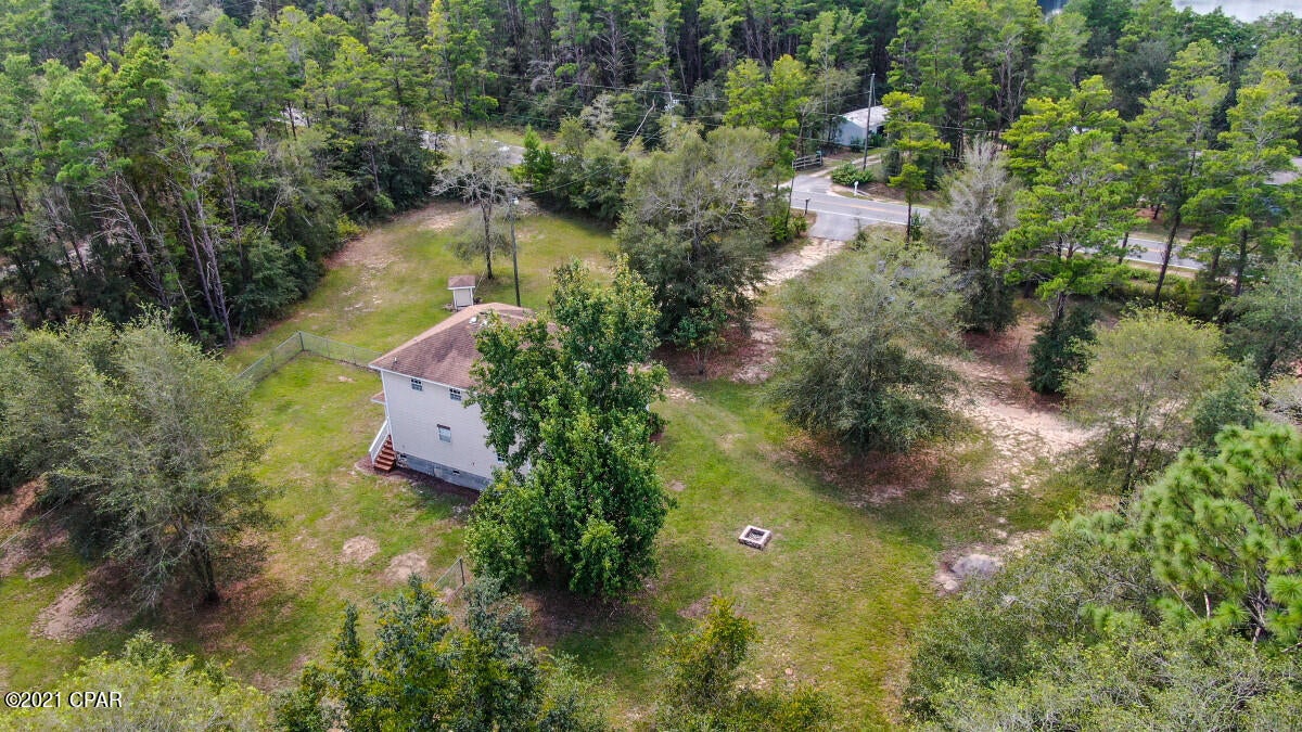 CURRENTLY UNDER CONTRACT, SELLER ACCEPTING BACKUP OFFERS

If you are looking for quiet country living nestled between picturesque spring feed lakes then this is the spot for you! This 2006 built 2 story home features a wonderful wrap around porch overlooking the front of the property with fenced in yard and pole barn out back. Inside the home has been completely refinished top to bottom. Fresh ceramic tile has been laid throughout the entire first floor along with new trim and baseboards. Additional work was completed downstairs to the galley style kitchen waiting for fresh appliances, indoor laundry room and half bathroom. Stairs to second floor have been sanded to a smooth finish enhancing the natural wood. All bedrooms are upstairs with the main bed to the right and beds 2 and 3 to the  Main bed is generously sized and walk in closet and smarty configured bathroom. All windows have blinds and all rooms have ceiling fans. Lucas Lake Road is paved making access to the surrounding natural beauty even more convenient.