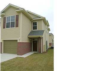 BRAND NEW toenhome in a gated community with hardwood floors and carpet, granite countertops, breakfast bar, screened porch, 1-car garage, and community pool.