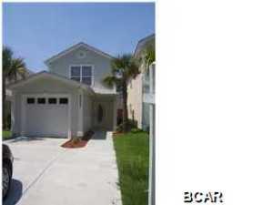 Practically new detached single family home. This is not a townhome, you own the land, unlike many other communities here at the beach. If you are interested in an affordable 2 bedroom, 1.5 bath home, with a garage, this home is for you. The downstairs consists of all tile, as well as the upstairs bathroom, with the bedrooms in Berber carpet. The kitchen is large with plenty of cabinet space, and comes complete with all appliances. The master bedroom upstairs has French doors leading to its own balcony overlooking the fenced in back yard with sprinkler system. This home is centrally located - close to the beach and navy base, schools, and shopping. Call to see today.