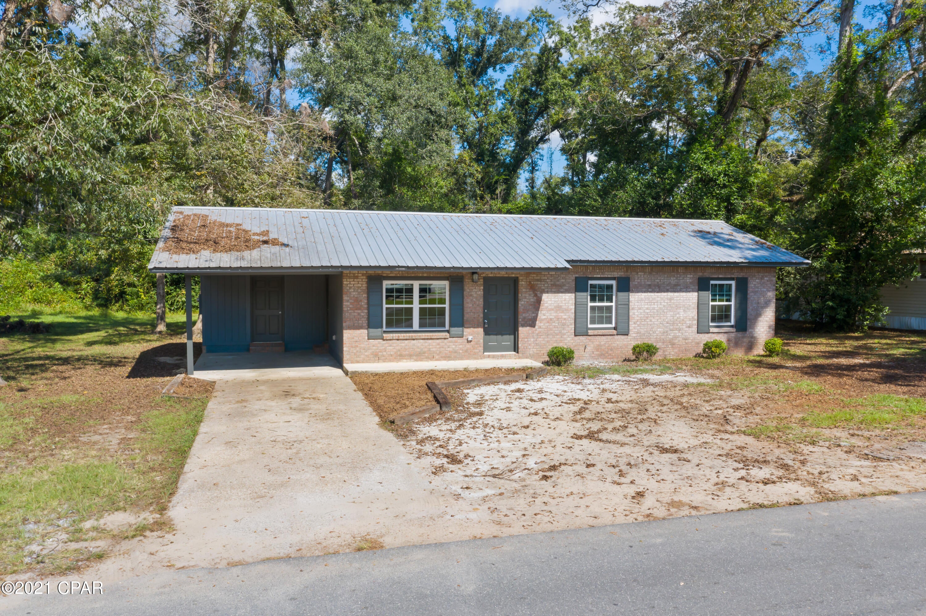 Freshly updated and ready for its new owner!  Sitting on 1/3 of an acre, this brick home is conveniently located.  This living area of this home features an open concept.  Kitchen features nice cabinetry and new appliances. There are three bedrooms, one bathroom. 

 Home also features a nice carport and metal roof.