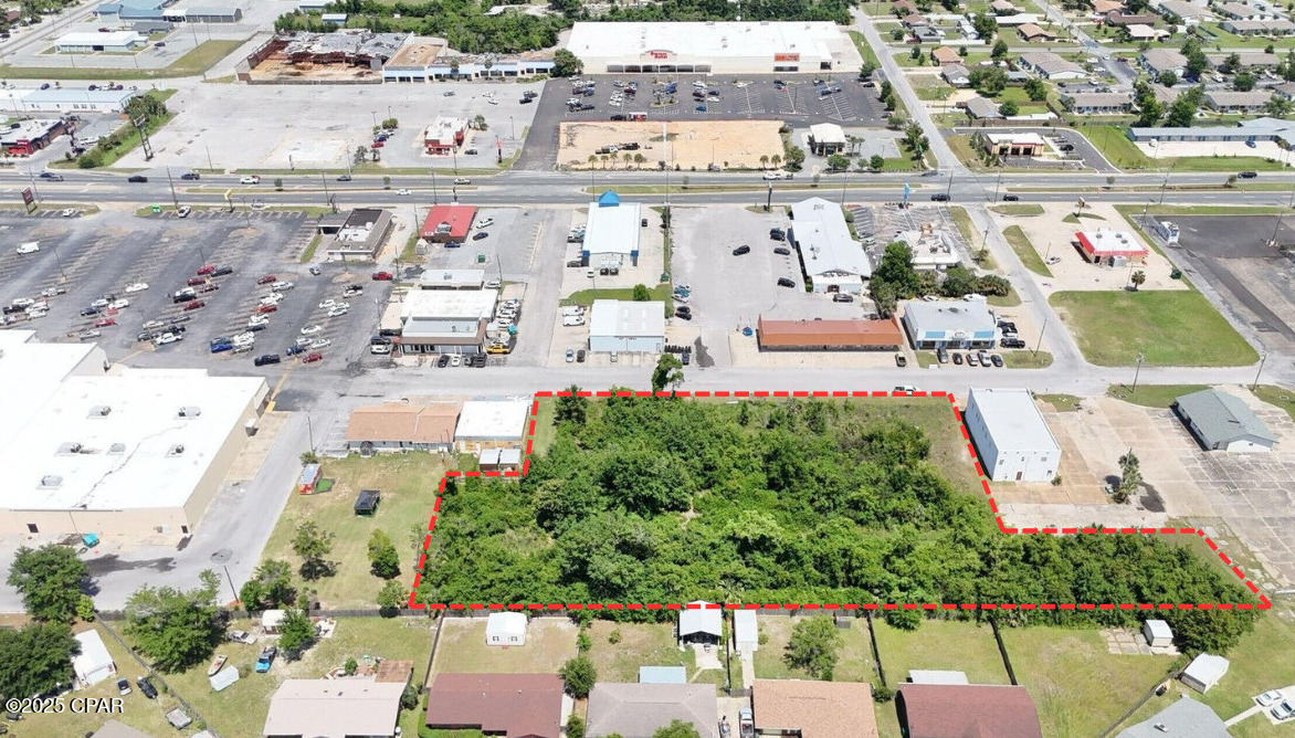 Prime Commercial Lot with Development Order in Place!
Exceptional opportunity to acquire a 2.33-acre commercial property located parallel to Tyndall Parkway (US-98) in the heart of Parker, Florida. This site is positioned directly behind Hungry Howie's, Mr. Pho, and #1 Asian Buffet, between Planet Fitness/Winn-Dixie and USA Storage Centers, offering outstanding visibility, easy access, and strong co-tenancy with national and regional retailers.

Currently offering conceptual plans for two ±10,000 SF warehouse/flex buildings, the site is ideal for a wide range of commercial, light industrial, or service-based uses. The property benefits from C-3 zoning, city utilities, and an efficient site plan allowing for ample parking, truck circulation, and landscaped buffers. Call today to learn more!