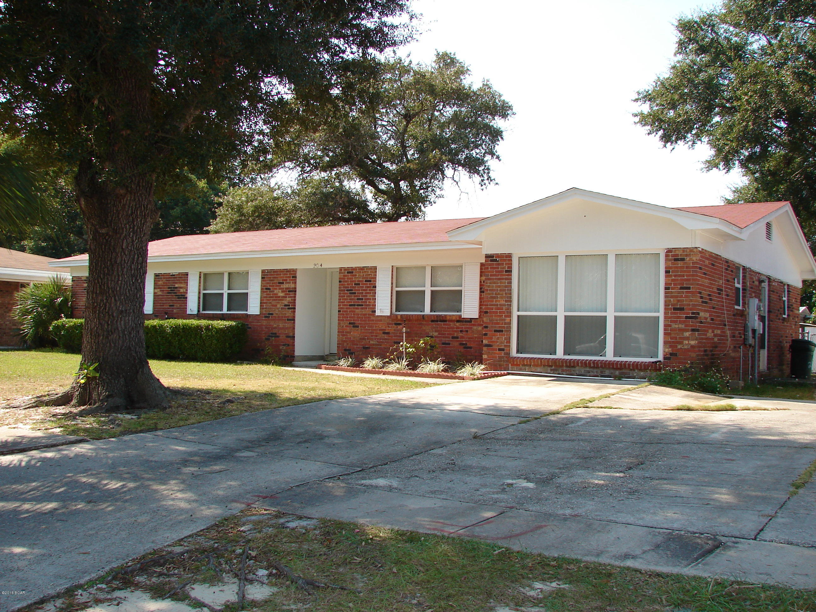 Nice ranch style home with large eating area, wood floors, formal living room & den. Conveniently located to Tyndall AFB, shopping, and schools