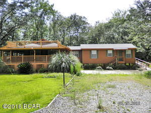 Home and 48 acres in the country lots of wildlife, deer, turkeys, large oaks, large covered porch, in-ground salt water pool, 24x48 pole barn with 12x20 loft plenty of room for food plots on the land. Home features 3/2 with a bonus room, hardwood and ceramic floors, white pine to tongue and groove ceiling, nice appliances, all close to town and I-10 exit, 45 min to Tallhassee call agent today to view this home.