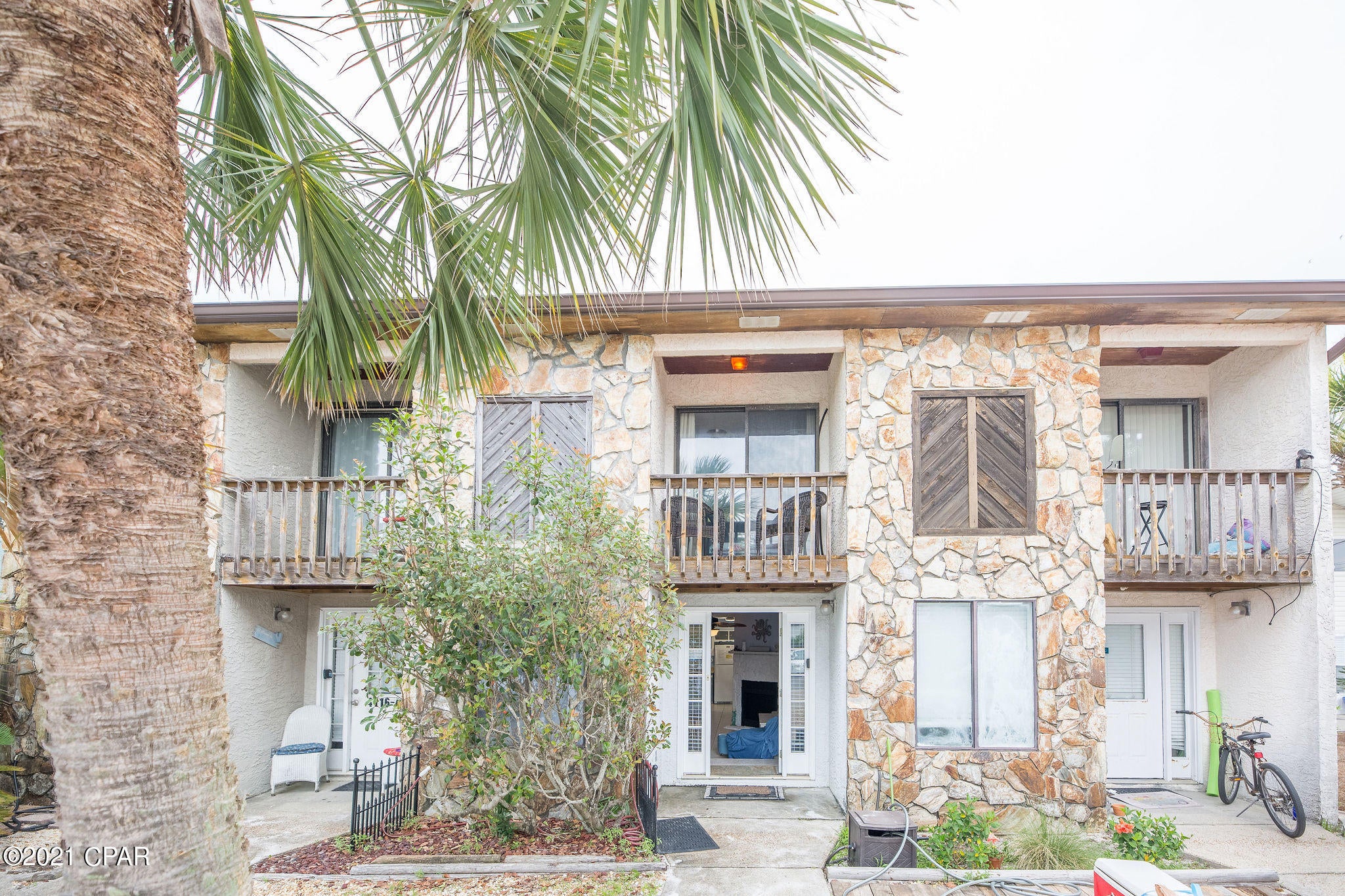 One minute walk to the World's Most Beautiful Beaches (we timed it), this 2 bed, one and a half bath townhome on the East End of PCB is close to restaurants, St. Andrews State Park, and area attractions! This unit is a strong vacation rental with gross rental returns over past years ranging from 24k - 31k and future bookings that will come with the unit! You can't get much closer to the beach without being ON the beach and from here, you can be on the beach quicker many times than you would be if you were in a high rise. Schedule your appointment to see this one today, it will not last at this price point!