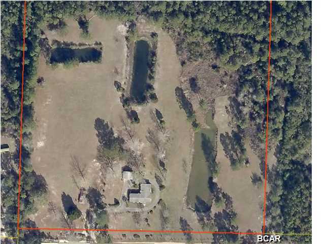 Reduced! Make Offer!Beautiful 10 Acres in Fountain with 3 ponds and fully fenced. 3 bedroom 2 Bathroom manufactured home. Driveway is paved all the way around the house.Covered carport.Nice covered back patio. The home needs some work but could be spruced up nicely. This is a quiet and nice area to escape to. Great location for horses as well. All information is deemed accurate but personal verification is suggested.