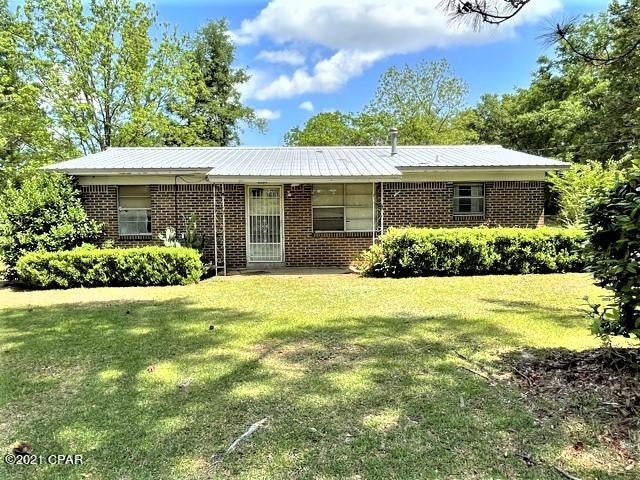 Cute brick house in the country on an acre of land. You have room for a garden, chickens, pets, etc.  With repairs and updates it will make a great starter home or just right for the retirees,   It is a great investment property.