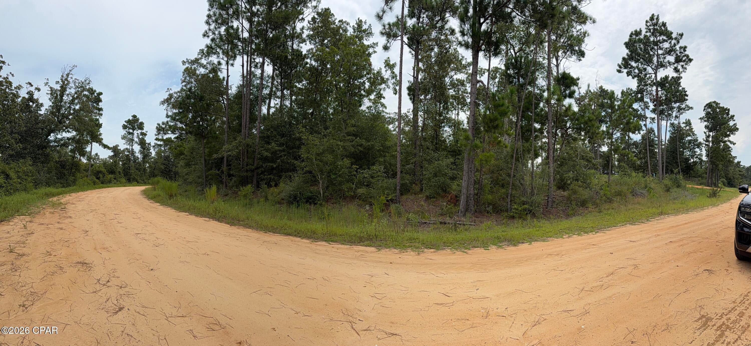 **Build Your Dream Home in Beautiful Compass Lake!** 

Welcome to **Lot 12 Postpile Circle in Alford, Florida**, a peaceful piece of Northwest Florida where you can slow down, spread out, and enjoy the beauty of nature. Tucked away in the **Compass Lake community**, this homesite offers a secluded setting surrounded by natural beauty and **scenic views all around** -- the perfect backdrop for the home you've always imagined.

Build your beautiful custom home among the trees and enjoy the quiet, laid-back lifestyle this community has to offer. With peaceful roads and plenty of nature to explore, the area is wonderful for **horseback riding, outdoor adventures, wildlife watching, or simply relaxing and enjoying the serenity**.

Enjoy the Compass Lake lifestyle with community amenities including the **lake and clubhouse**, and grab a bite nearby at **Olle's Restaurant**. Everyday necessities are still within reach, with **Dollar General approximately 15 minutes away**, allowing you to enjoy country living without being completely removed from conveniences.

Whether you're searching for a **full-time homesite, weekend retreat, or the perfect spot for your forever home**, Lot 12 Postpile Circle offers the peaceful Florida lifestyle you've been looking for.

**Bring your house plans, your horses, and your dreams -- and start imagining life at Compass Lake!**