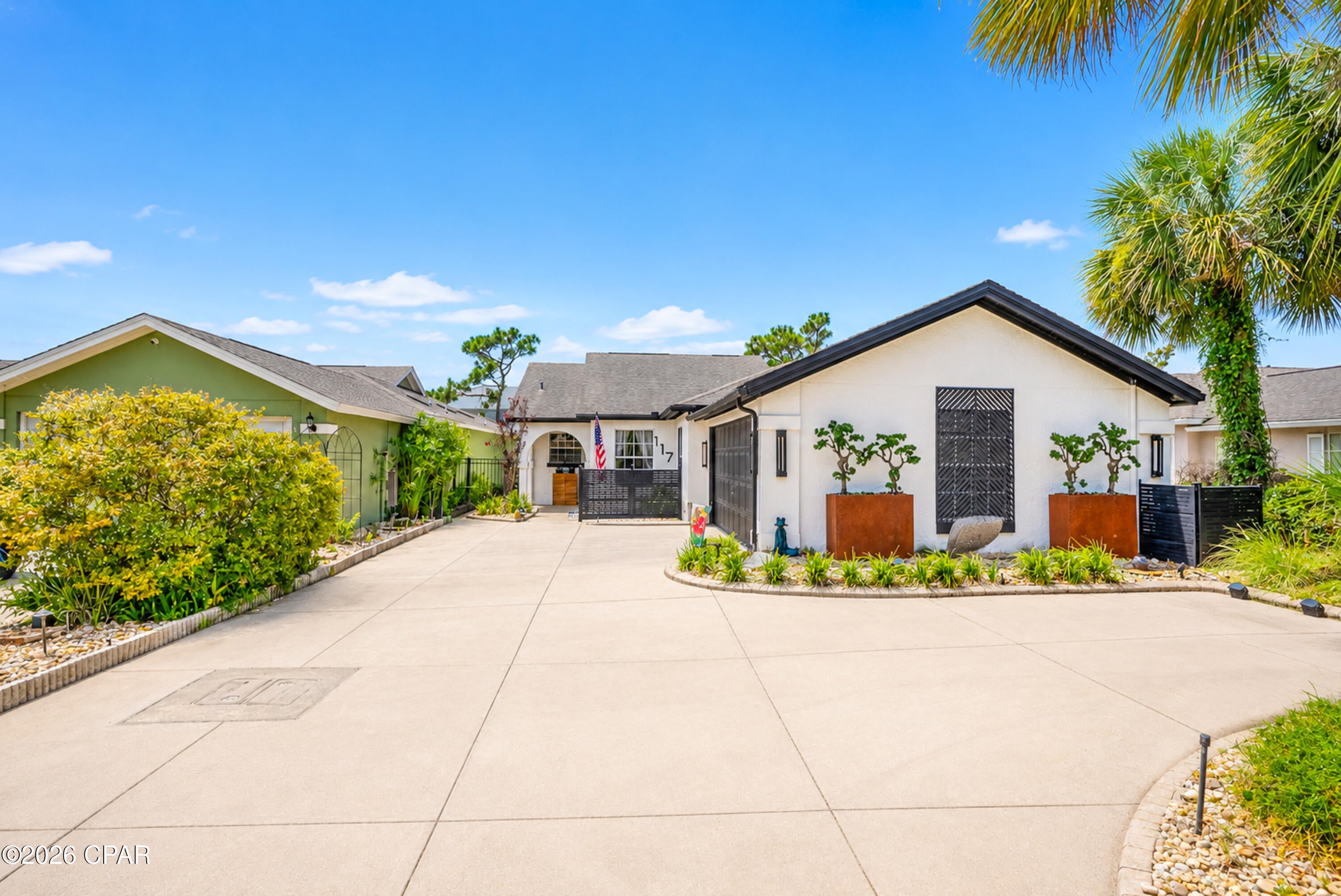 This is a must see, must experience the  luxury of paradise, impeccable, home with a fabulous lighted, heated pool. Designed to create your own backyard oasis, the pool features a spa, beautiful fountain, and color-changing lights that transform the space after sunset.  Welcome to a home that beautifully combines comfort, style, and resort-inspired living!  Located on a quiet cul-de-sac and conveniently located near shopping, dining, entertainment, and the beach, this 3-bedroom, 2-bath home  (3rd bedroom is currently an office/bonus room) offers an inviting open-concept design ideal for both relaxed living and entertaining. The spacious living area is highlighted by an impressive expansive ''double'' three-panel sliding glass wall that opens wide to the outdoor oasis, seamlessly blending the interior and exterior spaces and creating the perfect setting for indoor/outdoor living.  Inside, the open floor plan provides a wonderful sense of space and flow, while the versatile office/bonus room offers flexibility for working from home, hobbies, additional living space, or overnight guests. All appliances are included, making this home even more move-in ready.  The home is currently complemented by exquisite designer furnishings and décor that showcase the spaces beautifully. Furnishings are not included in the sale but may be available through separate negotiations.
Step outside and discover the true showstopper--an exceptional private pool, one of the largest in the neighborhood.  A cedar lined dry sauna adds another level of luxury. For added convenience, the pool and sauna are also accessible directly from the primary bedroom.  (There is also a completely tiled wet sauna, however the steam generator is not functioning.)   This outdoor retreat is designed with easy living in mind.  Extensive river rock and Bahama rock landscaping means minimal lawn care, giving you more time to enjoy the pool, sauna, and outdoor living spaces.
This property has been thoughtfully maintained and enhanced with numerous upgrades and updates. Be sure to review the complete list of features, improvements, upgrades, and updates included in the listing photos and documents.  With its peaceful cul-de-sac setting, convenient location, flexible floor plan, spectacular indoor/outdoor connection, low-maintenance landscaping, and extraordinary private pool and sauna retreat, this home offers the opportunity to enjoy comfort, convenience, and a touch of luxury every day.
