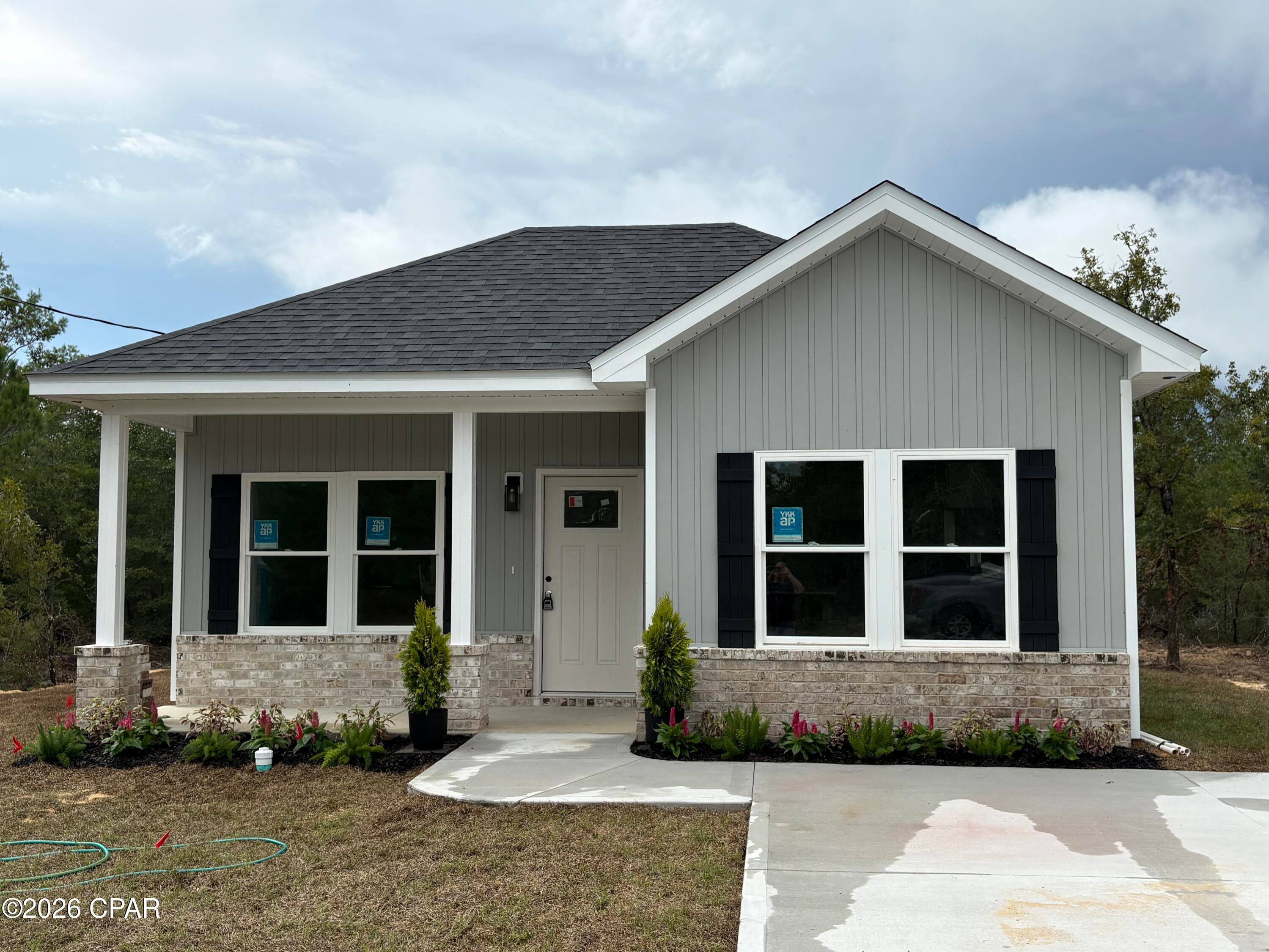 BRAND-NEW CUSTOM CONSTRUCTION IN SUNNY HILLS -- WHERE QUALITY, STYLE & VALUE COME TOGETHER!

Welcome to 3782 Airmont Drive, a truly exceptional brand-new custom-built home in the desirable Sunny Hills community of Chipley, Florida. Offering 1,424 square feet of heated and cooled living space, this one-of-a-kind spec home was thoughtfully designed and built by a quality-focused builder whose number-one priority is delivering superior construction, premium materials, high-end finishes, and exceptional value--without the premium price tag.

Forget the cookie-cutter track-home experience. This home was built with attention to the details that matter, from the construction techniques behind the walls to the beautiful finishes you see throughout.

Step inside and immediately notice the difference with 9-foot ceilings throughout the home, creating an open, spacious feel. The entire home features spray foam insulation, providing outstanding energy efficiency, improved comfort, and the potential for meaningful long-term energy savings. Beautiful luxury LVP flooring runs throughout the main living areas and bathrooms, while all three bedrooms feature high-end padded carpet for added comfort.

The heart of the home is the stunning kitchen, featuring luxury quartz countertops, a large center island, and gorgeous custom cabinetry loaded with upgrades rarely found at this price point. The cabinetry includes soft-close doors and drawers, crown molding, pop-ups, and thoughtful storage features. The kitchen is equipped with a complete suite of stainless-steel appliances, including a side-by-side refrigerator with water and ice dispenser, 5-element glass-top range, truly vented microwave hood, dishwasher, and garbage disposal.

The spacious master suite delivers a true retreat, with a beautifully appointed private bath featuring dual sinks, a large quartz-topped vanity, separate shower, relaxing garden tub, private commode room, and dedicated linen closet. Both bathrooms are finished with luxury quartz countertops and upgraded materials, continuing the home's commitment to quality from room to room.

An interior laundry/utility room adds convenience and functionality, while the home's 2½-ton, 15-SEER HVAC system provides efficient year-round climate control. Adding another unique touch, the home is equipped with an AROMELY smart-phone-controlled scent diffuser system, allowing you to customize the home's ambiance right from your phone.

Outside, the home makes a beautiful first impression with its classic brick front porch and attractive board-and-batten vinyl siding. The exterior design combines timeless character with low-maintenance practicality.

This isn't another mass-produced floor plan with builder-grade finishes. This is a one-off custom build, constructed with a focus on quality, craftsmanship, and value. The difference is in the details--and once you step inside, you'll see and feel it for yourself.

If you're looking for a brand-new home in Sunny Hills that offers substantially more in construction quality, features, finishes, and character than the typical track-built home, 3782 Airmont Drive is a must-see. Come experience the difference for yourself!