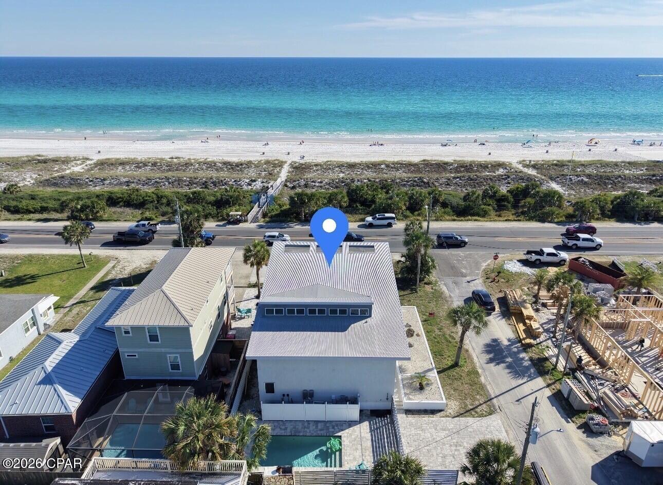 Rare newer-construction beachfront home in Bid-A-Wee with UNOBSTRUCTED GULF VIEWS, private beach access, and proven luxury vacation-rental capability. REACH OUT FOR RENTAL HISTORY AND IMPRESSIVE PROJECTIONS!

Designed to capture breathtaking, unobstructed water views, this stunning property showcases the sparkling Gulf from nearly every room.

Expansive windows flood the home with natural light, while the spacious porch and multiple outdoor living areas create the perfect setting for seamless indoor-outdoor entertaining. Wake up to the soothing sound of waves and enjoy sun-drenched interiors in the open-concept living space--ideal for both relaxing and gathering with family and friends.

Step onto the balcony to experience the fresh coastal air and unforgettable sunsets over the water.

With its distinctive design and serene beachfront setting, this home embodies the ultimate coastal lifestyle.

Currently operating as a successful vacation rental, the property comfortably sleeps 12 and features 6 spacious bedrooms, 6 full bathrooms, a private pool, and direct private beach access to the sugar-white sands and emerald-green waters of the Gulf. This is an exceptional investment opportunity, second home, or primary residence. Call today to experience the best of the Emerald Coast lifestyle!

Buyer to verify all dimensions, fees & written information.