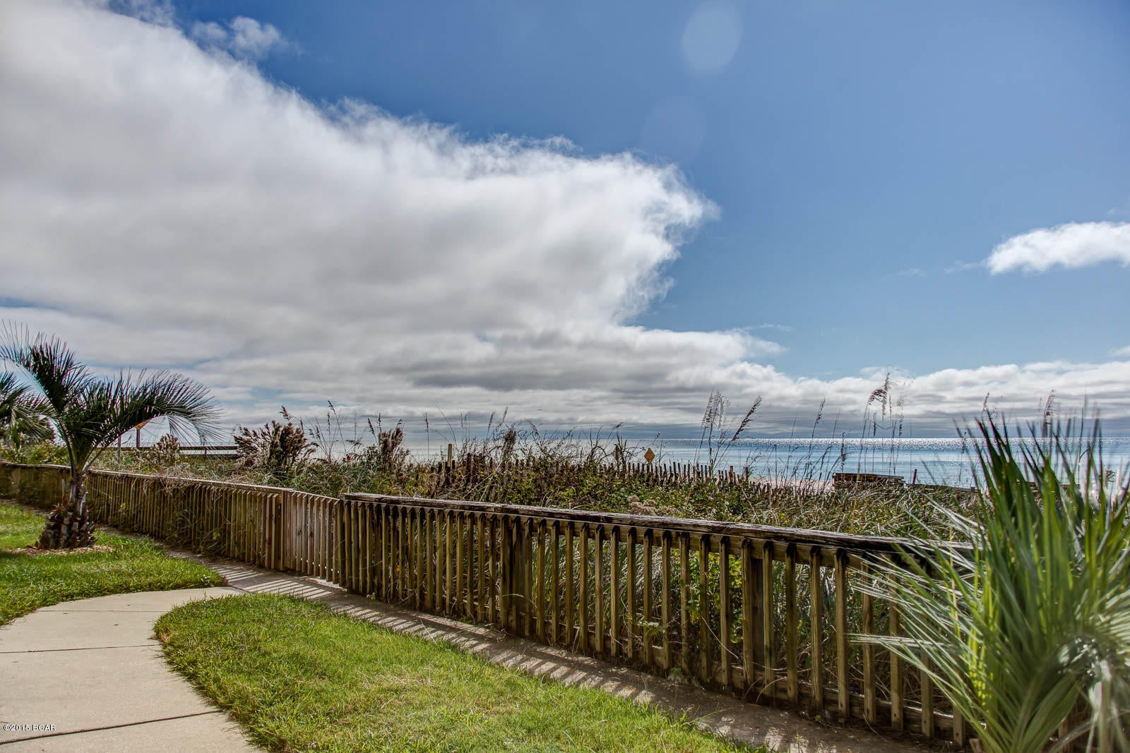 This condo is now priced to sell!  This can be your private oasis and vacation destination and you can enjoy this breathtaking  views from both the living area and master bedroom.  There is nothing more relaxing than the sound of the waves while relaxing in bed.    This unit is fully furnished ready for that beach escape weekend or as an income producing rental unit.  This gulf front two bedroom, two bath unit features an oversized balcony ready for you to entertain family and friends.   This condo has numerous upgrades to include granite countertops, crown molding, high ceilings, ceramic tile flooring, carpet and kitchen bar. Twin Palms is a newer low density complex and the amenities include pool, hot but, barbecue grills, pavilion and steam/sauna/exercise rooms.   All information contained herein is intended to be correct however buyer assumes complete responsibility for verification of all information.