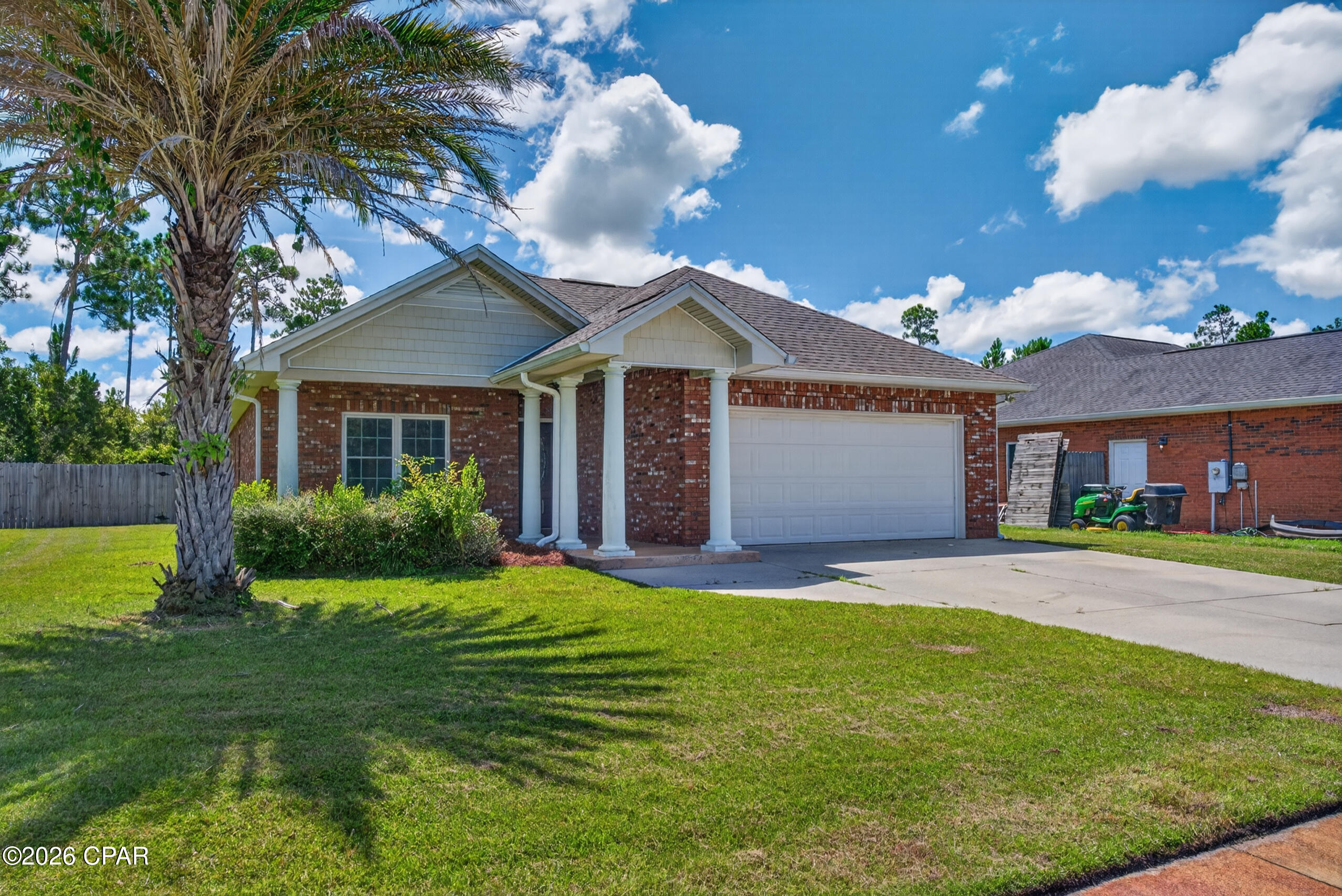 ONE OF THE BEST-PRICED ALL-BRICK HOMES IN CAMRYN'S CROSSING!

If you've been waiting for an opportunity to own a 3-bedroom, 2-bath all-brick home in the highly desirable Camryn's Crossing subdivision, this one deserves a closer look! Offering a great combination of location, functionality, outdoor space, and value, this home is designed for comfortable everyday living and easy entertaining.

Location is a major advantage! The home is conveniently located less than a mile from Bay Haven Charter Academy and Mosley High School and approximately 5 minutes from Publix, Walmart, shopping, restaurants, and everyday conveniences--helping make busy mornings, grocery runs, dining out, and daily errands that much easier.

Step inside to a welcoming open floor plan with thoughtful features you'll appreciate every day. Just inside the foyer is a convenient mud/drop area, providing the perfect place to hang coats, backpacks, purses, or leave shoes at the door--helping keep the rest of the home organized and clutter-free.

The spacious kitchen was designed with both convenience and entertaining in mind. A mid-level oven means less bending when putting in or taking out those heavier dishes--including that Thanksgiving turkey! The kitchen also features a breakfast bar and breakfast nook, giving you multiple options for casual meals, morning coffee, homework, or extra seating when entertaining.

For more formal occasions, there is a dedicated dining area, while the adjoining living room provides a comfortable gathering space complete with an electric fireplace for added warmth and ambiance.

Love to grill or entertain outdoors? You'll appreciate the open patio located just off the kitchen, making it easy to carry food and drinks between the kitchen and grill. And when you're ready to relax, head to the screened-in back patio--a great spot for morning coffee, evening conversations, or simply enjoying the backyard while staying protected from the elements and pesky insects.

Privately positioned toward the back of the home, the primary suite offers a comfortable retreat with dual sinks, a large walk-in closet, and an oversized walk-in shower.

The spacious backyard is another standout feature, accented by beautiful palm and crepe myrtle trees while still offering plenty of room to make the space your own. Imagine adding a swimming pool, garden, play area, outdoor kitchen, workshop, or additional entertaining space--there's room to create the backyard that fits your lifestyle.

Whether you're a first-time buyer, growing household, downsizing without wanting to sacrifice space, or looking for a well-located property with long-term appeal, this home offers tremendous possibilities.

With all-brick construction, a functional open layout, multiple dining spaces, indoor and outdoor entertaining areas, a spacious yard, and an exceptionally convenient location, this Camryn's Crossing home offers a lot for the price.

Come see why this could be the value you've been waiting for in Camryn's Crossing!