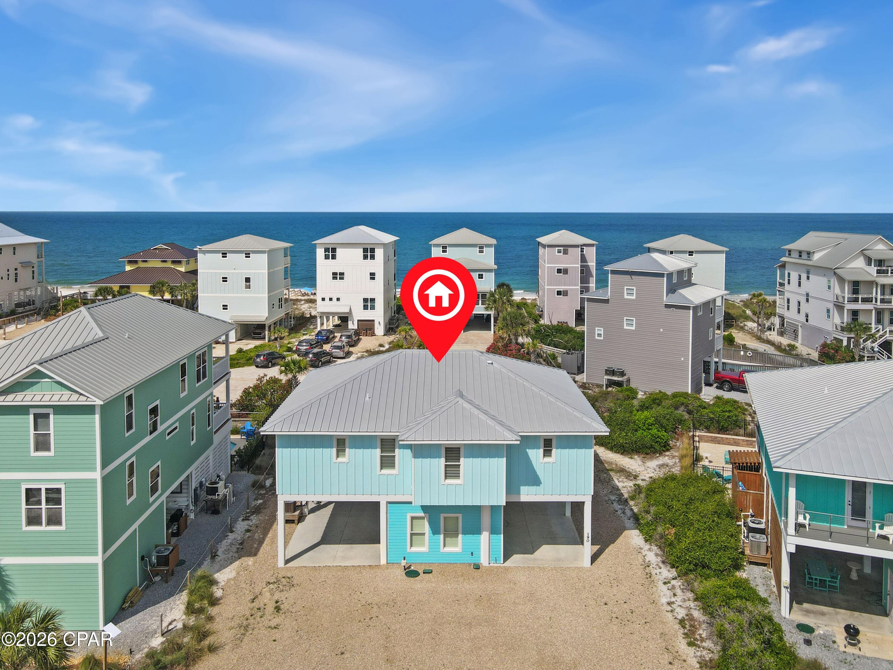 UNDER CONTRACT - ACCEPTING BACKUP OFFERS!  The best of coastal living can be found in this stunning 2023 beach home on beautiful Cape San Blas, where spectacular Gulf views, modern luxury, and timeless coastal design come together. Featuring 4 bedrooms, 3.5 bathrooms, and a private saltwater heated pool, this thoughtfully designed home offers the perfect retreat for full-time living, vacation escapes, or an exceptional rental investment. The open-concept living area is filled with natural light and showcases gorgeous shiplap accent walls, seamlessly connecting the spacious living room, dining area, and kitchen. The kitchen is beautifully appointed with quartz countertops, stainless steel appliances, a wine refrigerator, and ample space for entertaining family and friends. Directly off living space, step onto the screened porch to relax with your morning coffee or unwind while taking in breathtaking Gulf views and unforgettable sunsets. Designed with both comfort and convenience in mind, the home also features a private elevator, standing seam metal roof, Hardie siding, and an outdoor shower to rinse off after a day at the beach. A full bathroom on the ground level offers easy access from the pool area, making outdoor entertaining effortless. The large parking area is convenient for those with a boat to park and turn around, house also features 240 volt hookup for car chargers or RV on each side of parking underneath house, RV hook-up for power, water and sewer on-site. Located on the highly sought-after Cape San Blas, you'll enjoy sugar-white sand beaches, world-class fishing, kayaking, shelling, and some of the most beautiful sunsets on Florida's Forgotten Coast. Just a short drive away, downtown Port St. Joe offers charming boutiques, local restaurants, live music, and everything you need to complete the perfect coastal lifestyle.