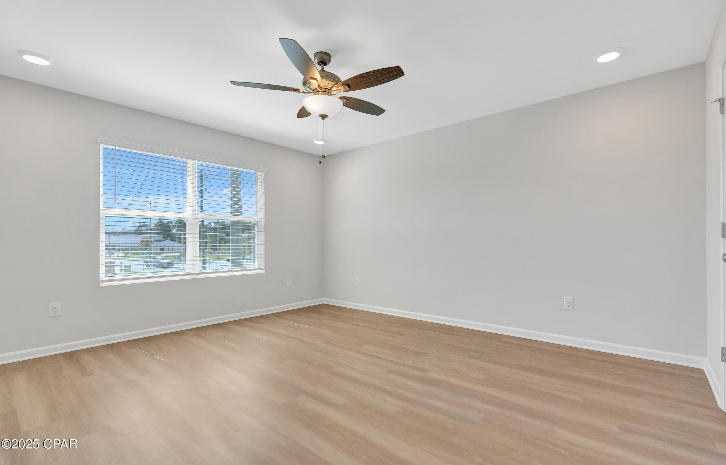 NO RENTAL RESTRICTIONS!!! Waypoint by Traton Homes, a vibrant new community of townhomes located on Front Beach Road in Panama City Beach, Florida. Waypoint offers 72 homes just under 3 miles from the beach, 1.5 miles from Dolphin Bay, and approximately 20 miles from the Northwest Florida Beaches International Airport. Residents will enjoy easy access to local attractions, with Pier Park only 7 miles away and Hathaway Bridge nearby, serving as the gateway to Panama City proper. The community is also conveniently situated near the Naval and Coast Guard bases.  Each townhome features 3 or 4 bedrooms, including a bedroom with a full bath on the main level. The open concept living space includes a modern kitchen with an island, a dining area, and a family room that opens to a private back patio. Upstairs, the spacious owner's suite offers a walk-in closet, and an ensuite bath with a double vanity, a shower, and a separate water closet. Two additional bedrooms, an additional full bath, and a conveniently located laundry room complete the upper level.