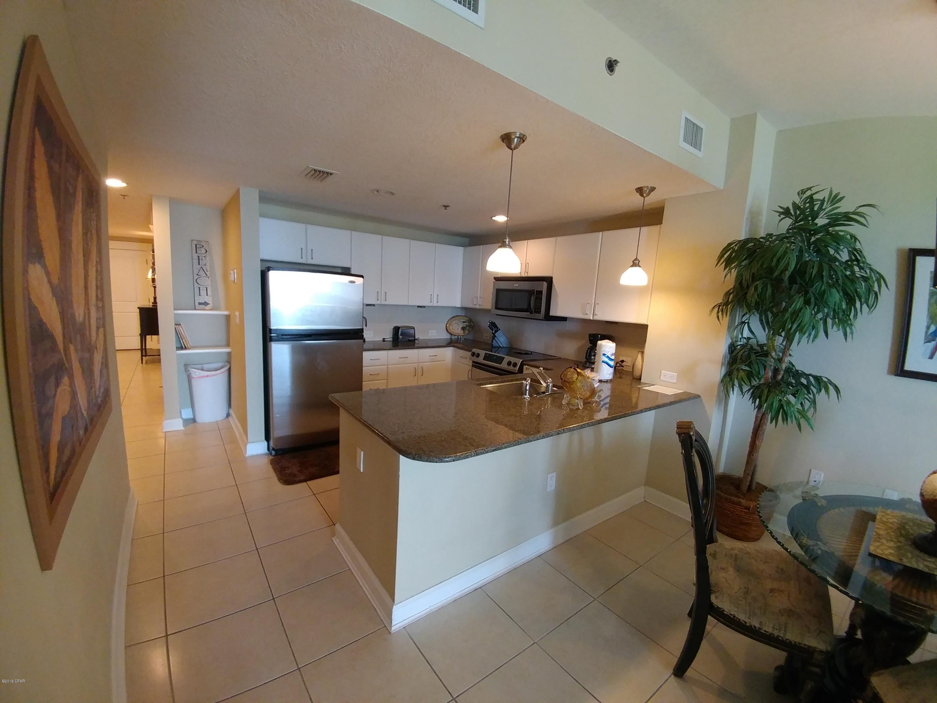 CURRENTLY UNDER CONTRACT, SELLER ACCEPTING BACKUP OFFERS. Don't miss out on this one a 2 bedroom 2 bath unit in the desirable Grand Panama Beach Resort.  The Grand Panama Beach Resort is one of the premier properties along the beach. Centrally located the resort offers a beautiful beach, two pools(one heated), hot tub, kiddie pool, Tiki Bar, gas barbeque grills, fitness center and more. This spacious two bedroom two bath offers spectacular gulf views from its private balcony. Appointed with granite countertops, stainless steel appliances, alcove with sleeper couch and tile floors throughout. As soon as you walk in you will appreciate its condition and spectacular views from the 16th floor. As you lie in bed or on your couch you can both hear and see the gorgeous emerald waters of the Gulf. Tastefully decorated as your turn key private beach getaway. Has great rental potential with a onsite rental management company that does all the work for you. Just sit back from afar and enjoy monthly rental checks. Grand Panama Resort is on the VA loan approved list.
     Just down the road is Pier Park the areas newest premier shopping and dining location. An open air lifestyle center that also features tourist attractions and an outdoor stage for events and concerts.
     All information believed to be correct but should be verified by the buyer.
