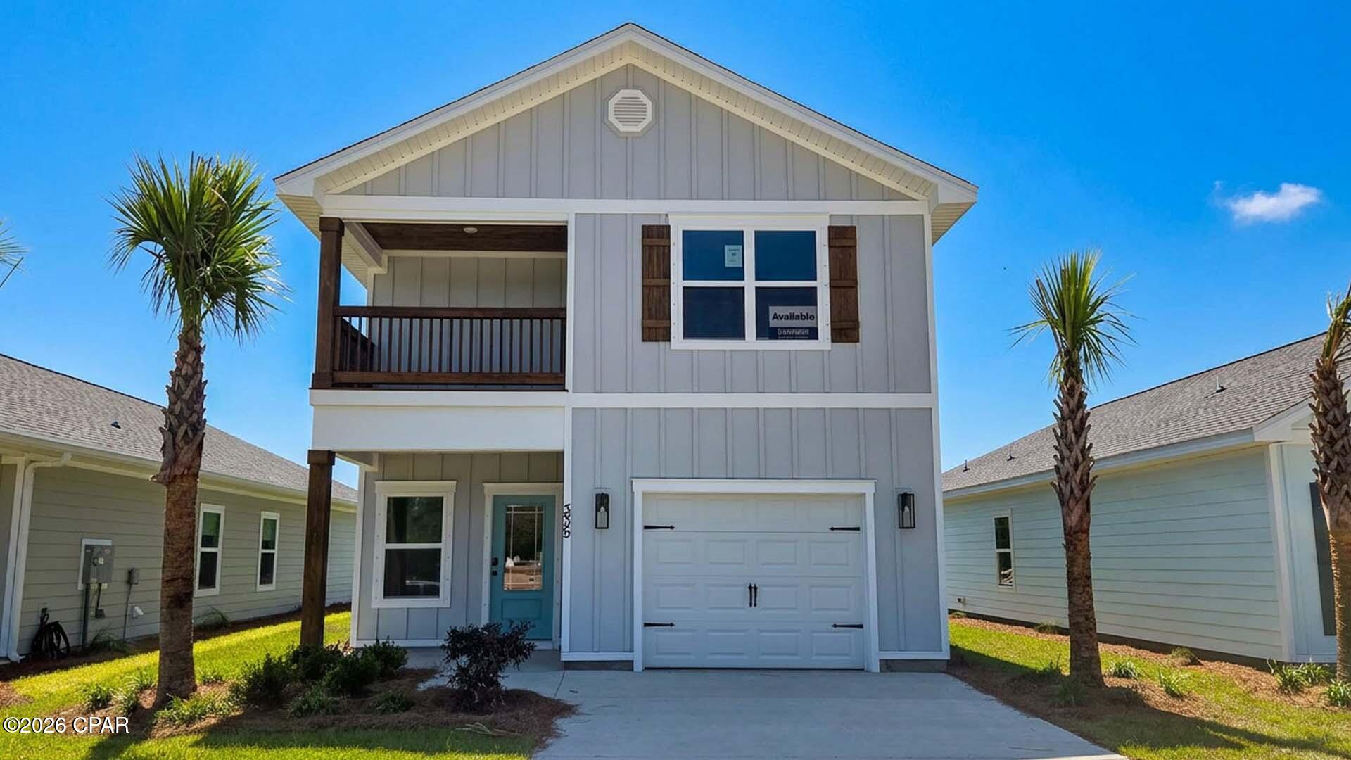 Welcome to 335 Robinson Bluff Road at Colonial East in Panama City Beach Florida. This home is ready for move in and features the Monroe floor plan. There is a small nook just off the entry and a brightly lit entry hall leading to a grand living space on the main level. The open concept design of the main living area features a kitchen with peninsula bar that has pace for seating. Traditional 9' ceilings grace the living area which opens to the covered back porch. The main level serves as the heart of the home with plenty of space. The interior of this home will include elegant features with a modern flair including a tile backsplash in the kitchen and quartz countertops, EVP flooring throughout creating a seamless transition between rooms. The kitchen is equipped with stainless appliances including a smooth top stove, microwave and dishwasher. 

Upstairs you will find all bedrooms and a landing with laundry area and shared bathroom. The Primary bedroom is located overlooking the front lawn and has a private ensuite bathroom. Two large closets are located in the primary bedroom and offer plenty of space for your wardrobe needs. The primary bathroom has the feel of a private oasis with a soak tub and a separate tile shower with glass enclosure. The dual sink vanity offers lower cabinetry for storage. Enjoy a quiet evening on your covered balcony located off the primary bedroom. The laundry room is conveniently located on the second floor. Images are of model home and may include custom design features not available in other homes. Furnishings and decorative items are not included with home purchase.