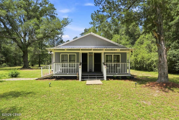 Welcome to your own taste of true Florida living! This Old Florida Cracker-style home checks every box for peaceful living, while being close enough to some of the most beautiful nature in all of Northwest Florida.

Built in 1941, this three bed, one bath home is full or character and personality that simply cannot be replicated in newer construction. 

In addition to being meticulously maintained, this home has benefited from several important updates in recent years, including a complete electrical rewire in 2019, a new metal roof in 2019, and a new well pump in 2019. Behind the home, a large storage shed provides additional space for several uses. 

If you're looking for true Florida living with room to breathe, this property delivers. Set on an acre of land, close to several natural bodies of water, Sunny Hills Golf Club, and within an hour of the worlds most beautiful beaches, this could be your ideal opportunity. Inquire for all information!