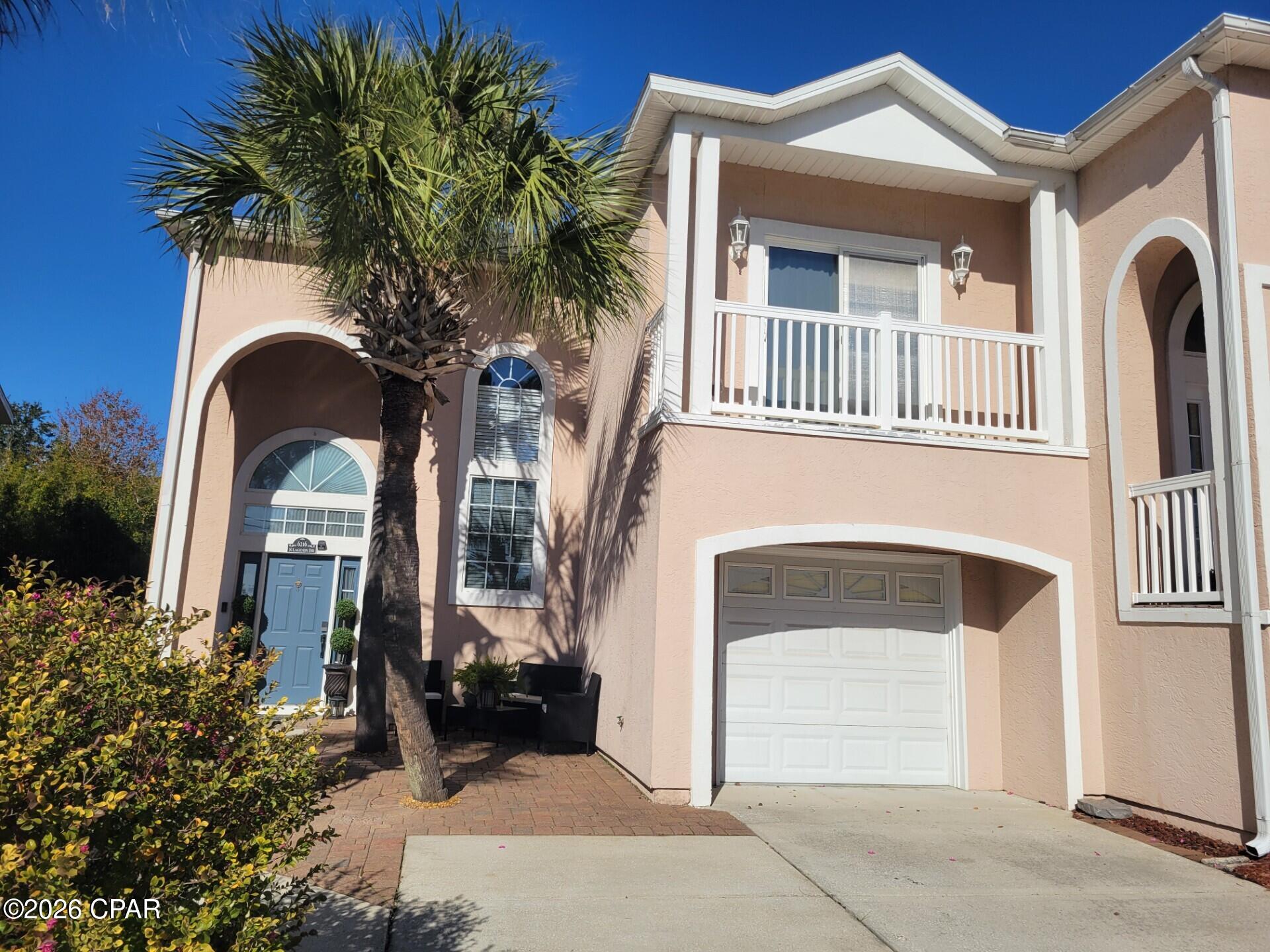 *$10k Price Improvement!!* Welcome Home! Spacious end unit Townhome close To Everything! Walking distance to the Beach, Capt. Andersons, Schooners, St. Park, Shopping, Fishing, Pontoon Rentals & Marinas. Features Include: Beautiful view of the lagoon from private master balcony, secluded open deck off of 2nd and 3rd bedrooms, Large Screened In Patio, breakfast bar & added Loft Area not available in other units that is large enough for an office or gaming area! Finished, Oversized One-Car Garage, HVAC 5~yrs new. New flooring upstairs. Newer SS appliances. Roof 2019. Double parking unique to only a few units. Min. 6-month rentals allowed. Buyers/Rep. to Verify All Information Deemed Important