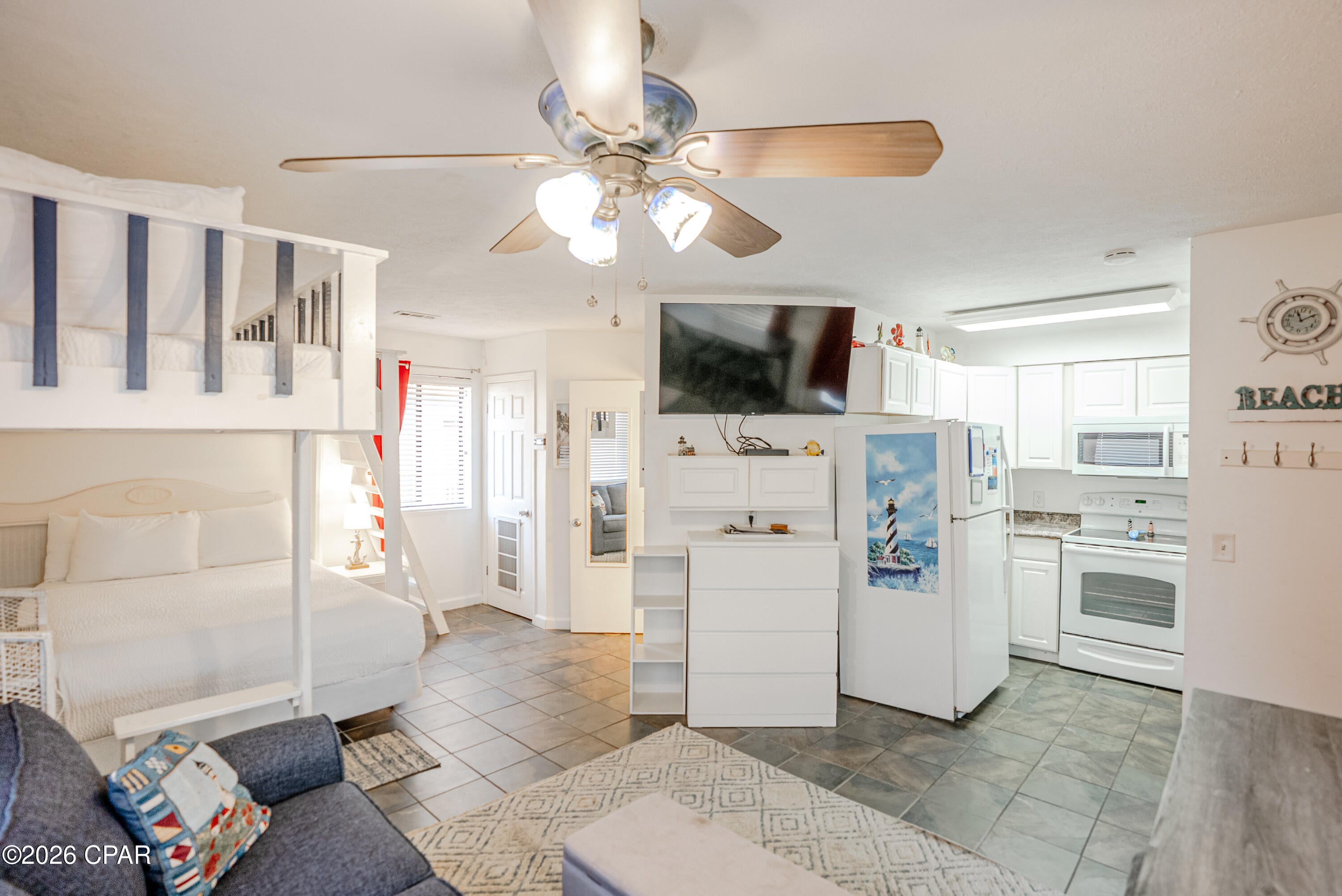 Discover one of the best beachside values in Panama City Beach--a rental-ready studio just steps from the sand. Located in Sand Castle Villas, this beautifully maintained and fully furnished studio condo is truly turnkey and ready to generate income from day one. With custom built-in loft beds, a luxury main sleeping area, and a smart, space-efficient layout, making it especially attractive for short-term rental demand. This condo is one of only two units in the entire complex featuring a rare U-shaped kitchen, offering extra cabinet and counter space--a standout feature for guests and owners alike. The kitchen is fully stocked and features all white appliances, while tile flooring throughout, serene coastal tones, and tasteful décor create a bright, inviting beach retreat.
Enjoy less than a one-minute walk (approximately 150 steps) to the white sugar sands and emerald waters via Beach Access 13 and 14. The complex is well known for its strong short-term and long-term rental performance. Additional highlights include: Private fenced pool and outdoor shower,
Private laundry room just outside the unit with washer, dryer, and extra storage, one assigned parking space plus overflow parking, and balcony space to relax and enjoy the coastal breeze.
Peaceful, smaller complex with a personable, laid-back atmosphere, Close to restaurants, shopping, and a short drive to Pier Park. Whether you're looking for an affordable personal beach getaway, a high-performing investment, or both--this studio delivers exceptional value, charm, and income potential under $150K in today's market.