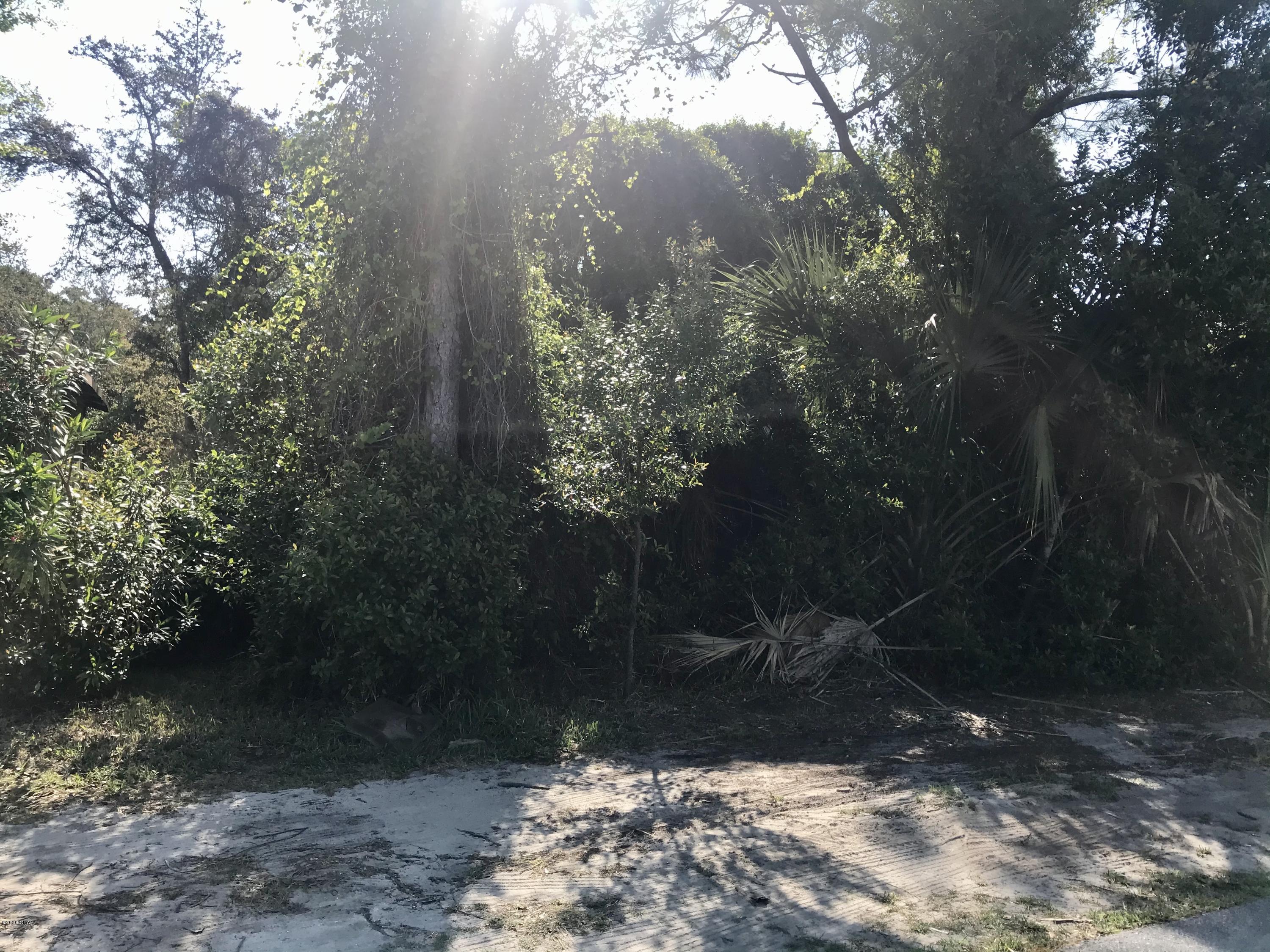 Great wooded beach lot; only 1 1/2 blocks to the sandy beaches of the Gulf . Access to the beach is very accessible at Twin Lakes and Front Beach Road. 



**** Have a couple of builders , if you need one.