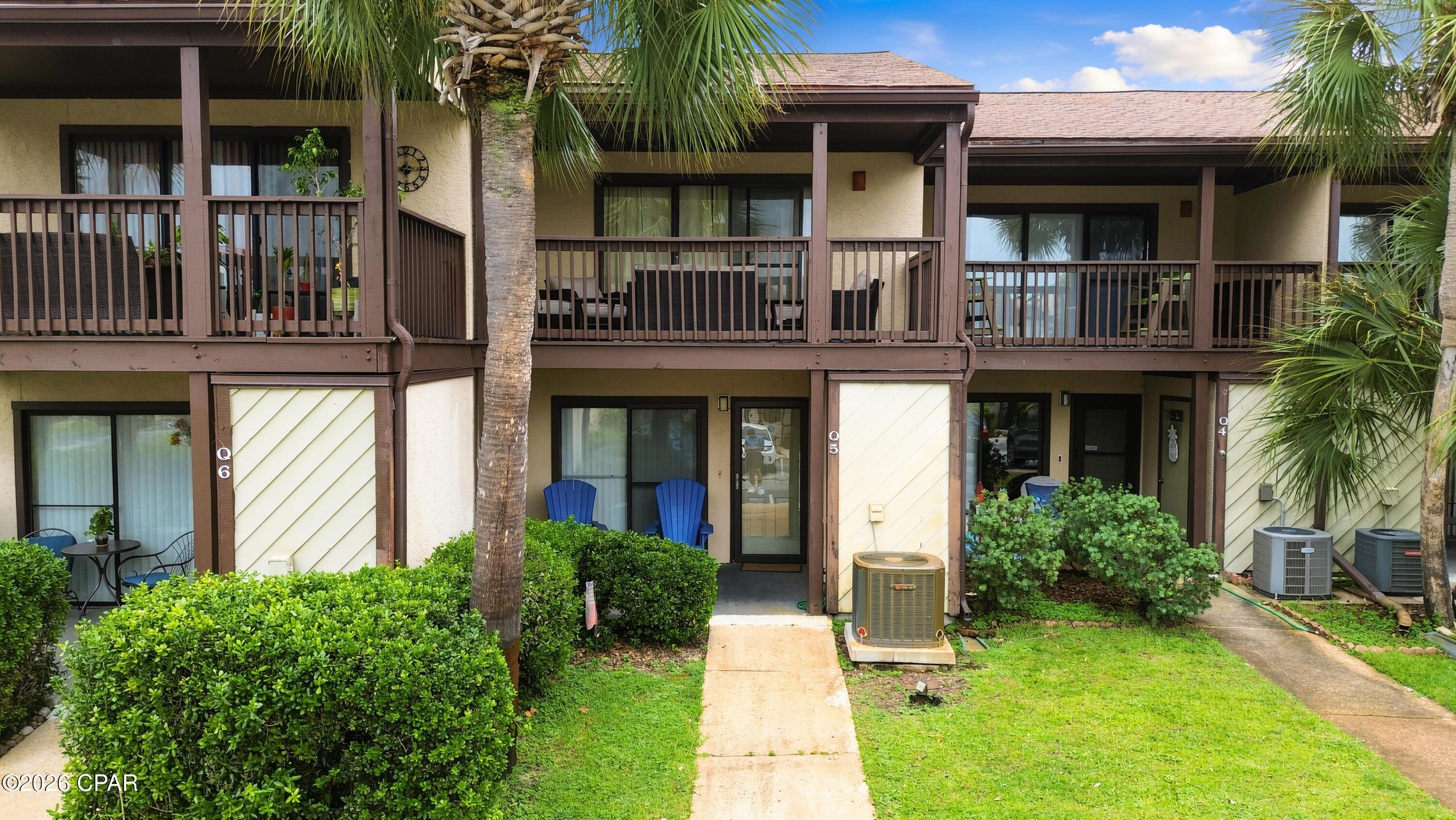 Welcome to the Coastal Dream at Portside Resort - Plus $32.5K Income Potential & $2K Flooring Credit! Embrace the relaxed, golf-cart-friendly lifestyle of PCB's quiet west end. This beautifully updated 2BR/1.5BA townhouse-style condo offers the perfect blend of resort amenities and neighborhood charm. Wake up and sip your morning coffee on your private balcony, take a short stroll to the iconic Thomas Donuts or Carousel Supermarket, and spend your afternoons with your toes in the emerald waters, just a brief walk away.

Inside, the home shines with an upscale kitchen featuring granite countertops, and durable tile flooring downstairs. Portside Resort Amenities Include: 3 pristine pools (one heated for year-round enjoyment), Hot tub, kiddie pool, and a poolside clubhouse, Tennis and shuffleboard courts. Whether you're looking for a permanent slice of paradise or a highly profitable vacation rental projected to bring in $32,500 gross annually, this fully furnished condo delivers the ultimate beach lifestyle with built-in savings. Schedule your private showing today!