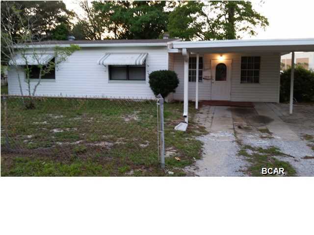 Great little starter home or rental as property located directly across from college. New roof, repainted exterior. Private master bath in master bedroom. 3 bedrooms two full baths, large den plus living room. Big kitchen and dining room. Nice large covered patio. Fenced yard. Train tracks out back but at train port depot. Train travels past everyday at approximately 11:30 am, at about 5 miles an hour or less. Quiet neighborhood.
