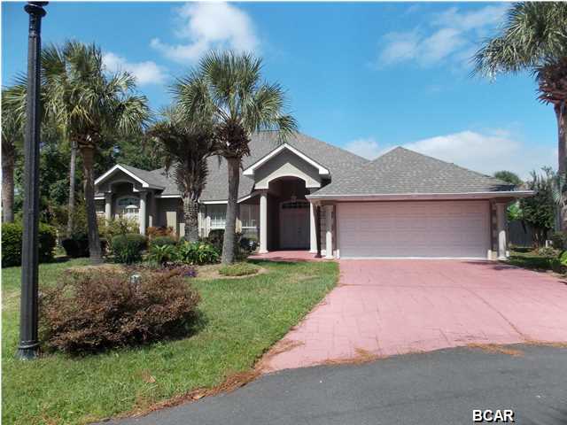 Beautiful custom built pool home located in Palm Bay.Enter into the grand foyer and you will see the nice open concept floor plan with views of the pool .The great room features 12 foot ceiling and stunning columns.There is a gas fireplace and built in book shelving..double sliding glass doors lead to the covered lanai .The great room has Ceramic tile flooring from Spain that looks like hardwood flooring.The dining room has trey ceiling and lots of windows for natural lighting.There is sliding glass doors in the dining room leading to the lanai and pool area.The kitchen has a open concept and plenty of cabinets and counter space.The master bedroom is very spacious and is located at the back of the home with a walk-in closet.The master bath has a double vanity, Jacuzzi tub,separate