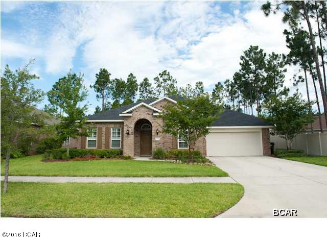 Remarkable home in like new condition! Owners have taken superb care of this fabulous 4 bedroom, 3 bath home that also has a separate study. If you are needing a home with a lot of space this is it! Home has many upgrades to include: HUGE California Walk-In Closet in Master, 16'' upgraded tile with inlay, hardwood floor in formal dining, granite on kitchen countertops, center island(breakfast bar) and on serving bar separating breakfast area and family room. Kitchen and bath cabinets are glazed and look rich and beautiful. The oversized Master bath features his and her vanities, a deep soaker tub, a frameless glass shower, a linen closet and a water closet. Plantation shutters adorn the windows in the study and also the front additional bedroom (which has a walk-in closet).  All windows are oversized, have a high wind rating and have cellular shades that let down from top or up from bottom. Enter the study through beautiful French doors. Judges panels, w/chair rail, dress up the walls around the entire room. Home also features wall speaker cabling and additional network cables through all rooms. Back lanai has been screened-in and also features a nice size storage building that is large enough to house yard equipment. There is a lawn sprinkler system that is unmetered using reclaimed water (that means it is FREE!). Keep a beautiful lawn all summer long and it won't cost you a fortune! You are just minutes from shopping & some of Bay County's best schools. All sizes and measurements are approx.