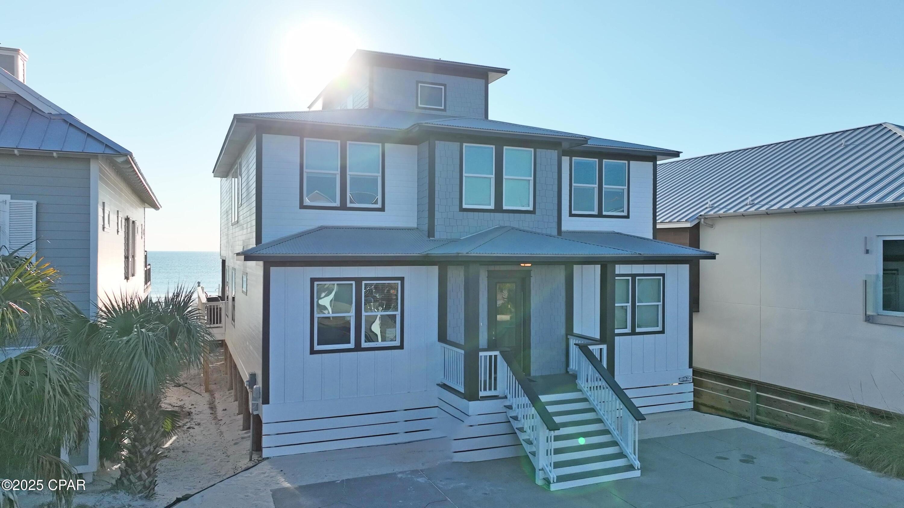 ''INVESTMENT PROPERTY'' This beautiful Private Beach home is a money maker! It has produced over $400k in rentals a year over the last four years. It is already booked at 70% for 2026!  The location is great in the heart of all the attractions in Panama City Beach! The home has a 14x24 heated pool, hot tub , and over 2000sq ft of back deck to enjoy. You can walk off the back deck right into the beautiful white sand, and into the gulf!  Home also boasts plenty of parking for boats, motorcycles, or RV's. With 9 bed rooms and 7 bathrooms there is room for the entire family! King size beds are in seven of the nine bedrooms, and almost every room has a beautiful view of the gulf. Home has a Large open area for entertaining and Gourmet Kitchen. There is also a separate Media/Game room for the kids upstairs with game table and large flat screen TV. ''Making Waves'' is a premiere gulf front home with a proven rental record! You must come see it for yourself!